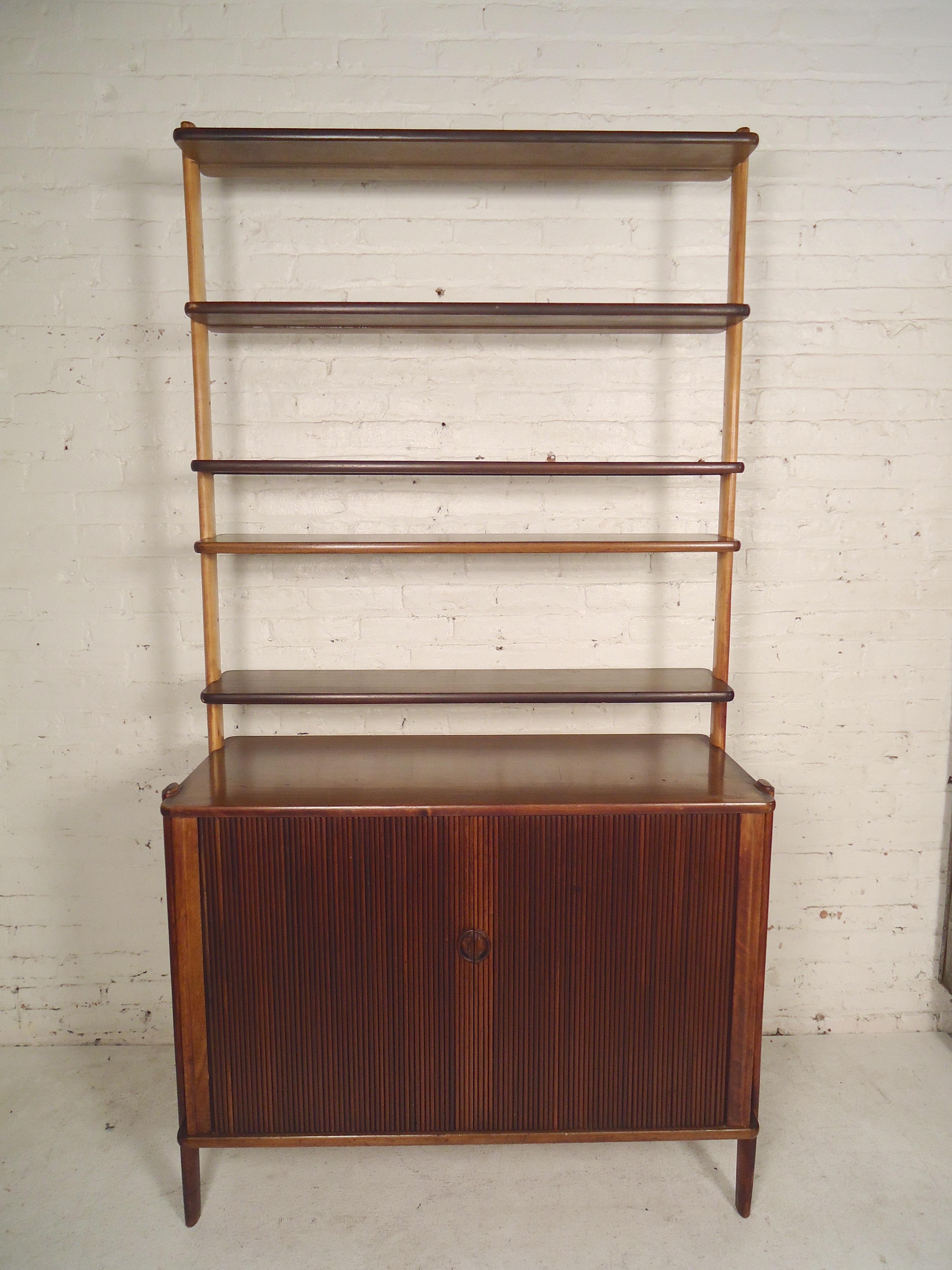 Standing shelving unit with tambour door storage base. Adjustable shelves, cabinet storage, great for home or office.

(Please confirm item location - NY or NJ - with dealer).
      