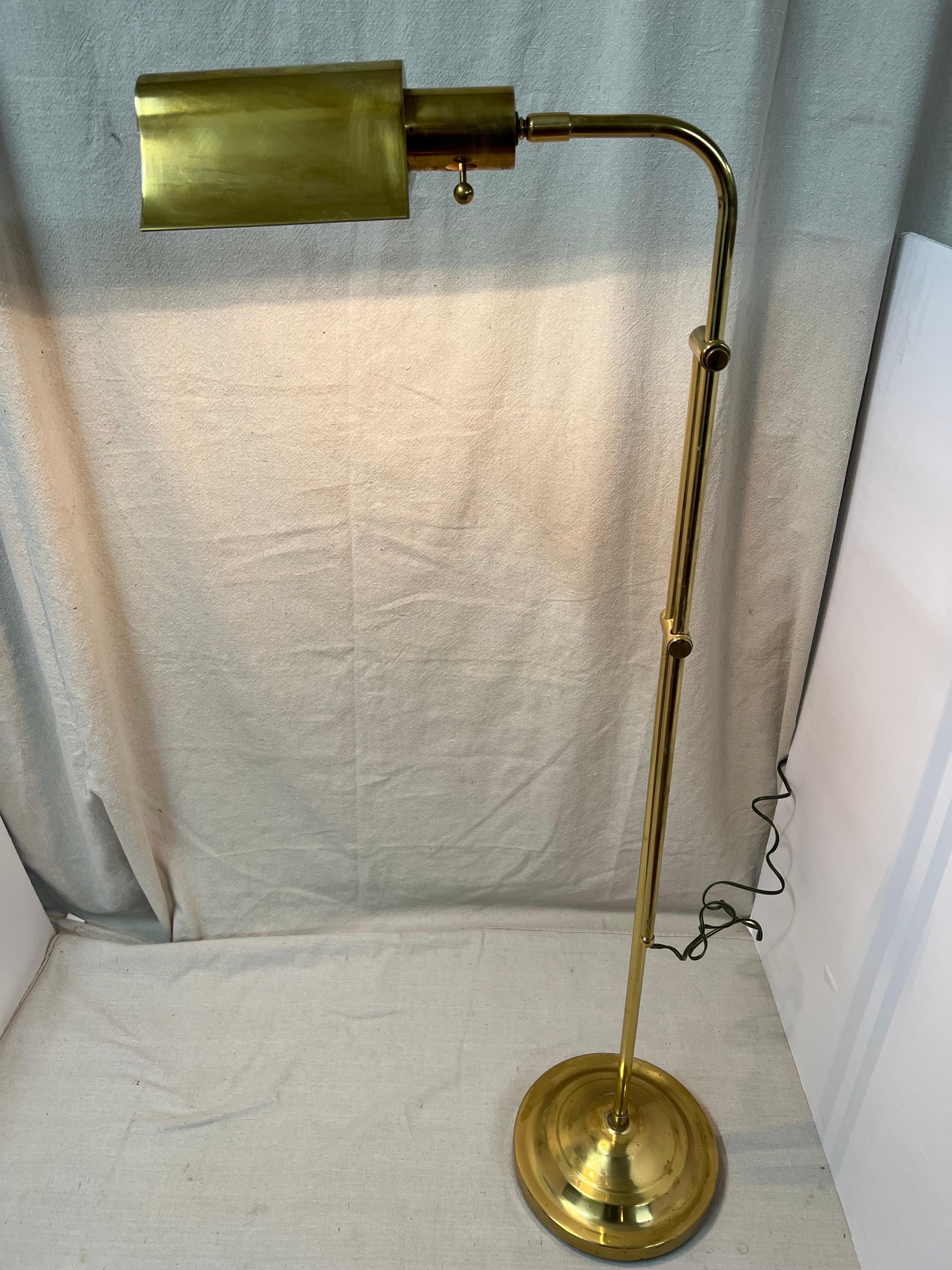 Mid Century Modern Brass Stiffel style Floor Lamp. Iconic design that will go in any room.
This adjustable floor lamps height range is 42