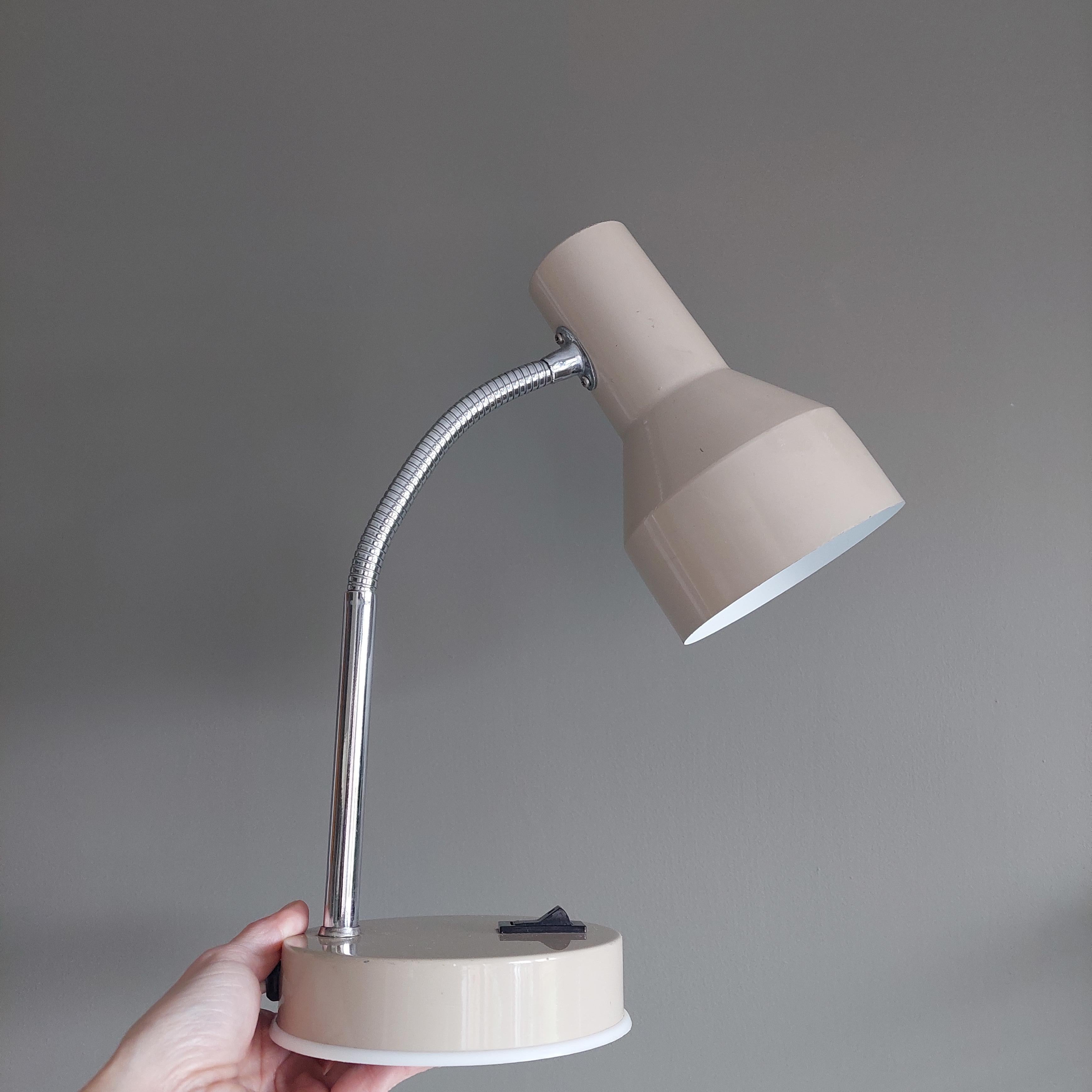 1970s Retro Desk Lamp made in the style of Veneta Lumi for BHS
Vintage beige/light mushroom coloured metal desk lamp Bauhaus style mid-century.

The arm and shade are adjustable, making the lamp well-suited for reading.
Painted metal shade and