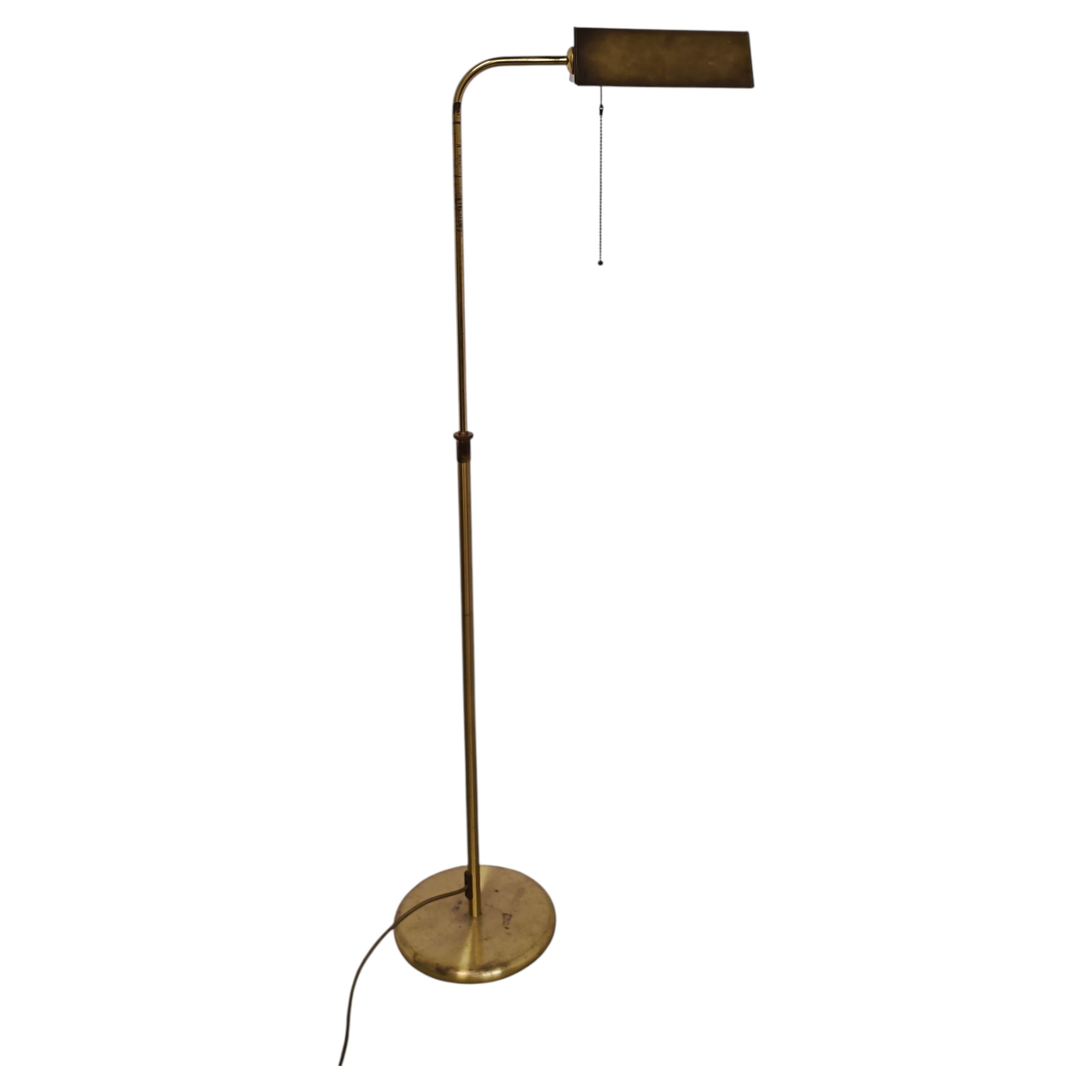 Mid Century Adjustable Floor Lamp for reading done in Brass, Germany 1960s