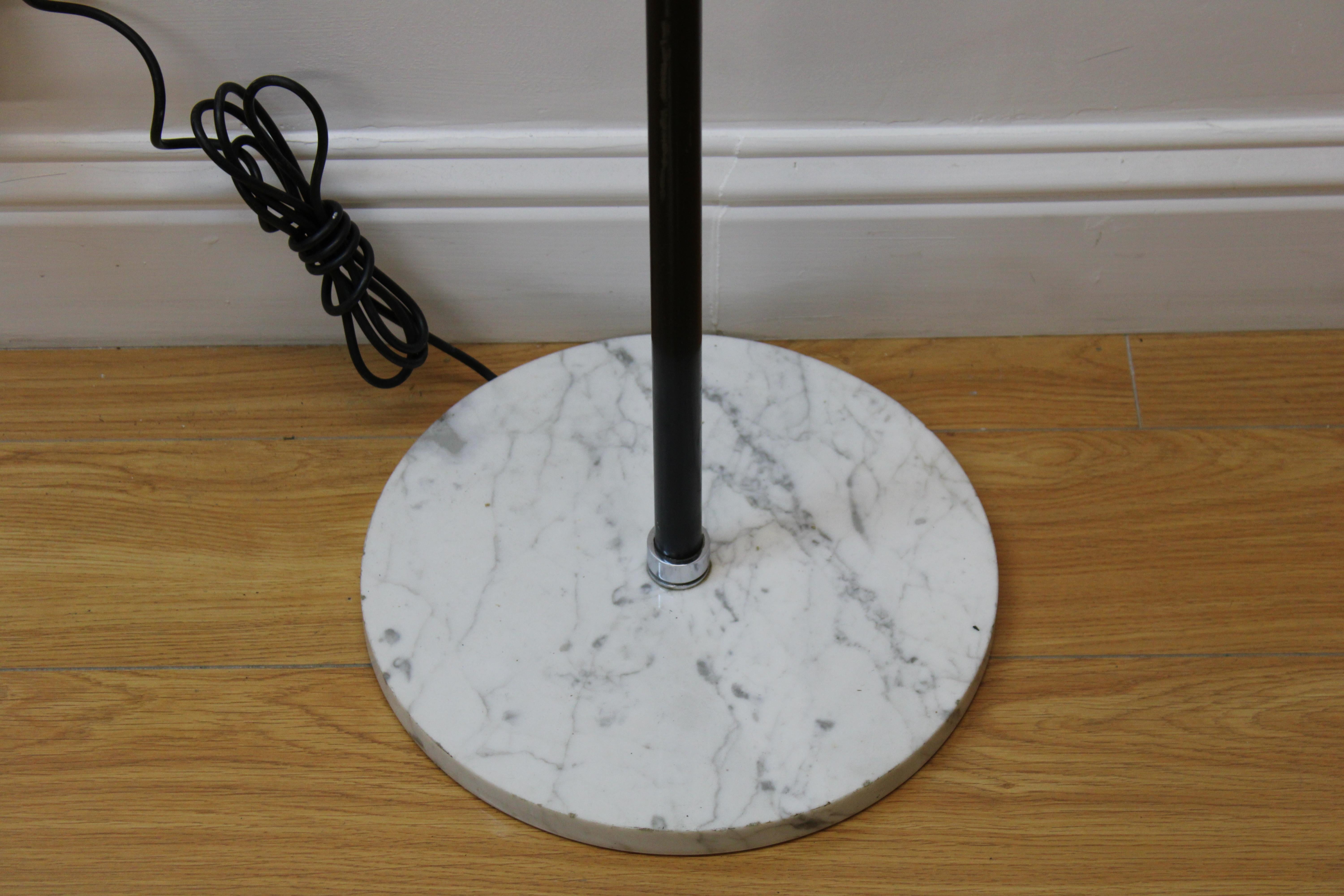 C. 20th century

Mid-century adjustable enamel floor lamp w/ marble base

Dimensions of lamp:

Top: 10.50 ( lamp head )
Middle: 1.25 ( body )
Bottom: 12.00 ( base ).