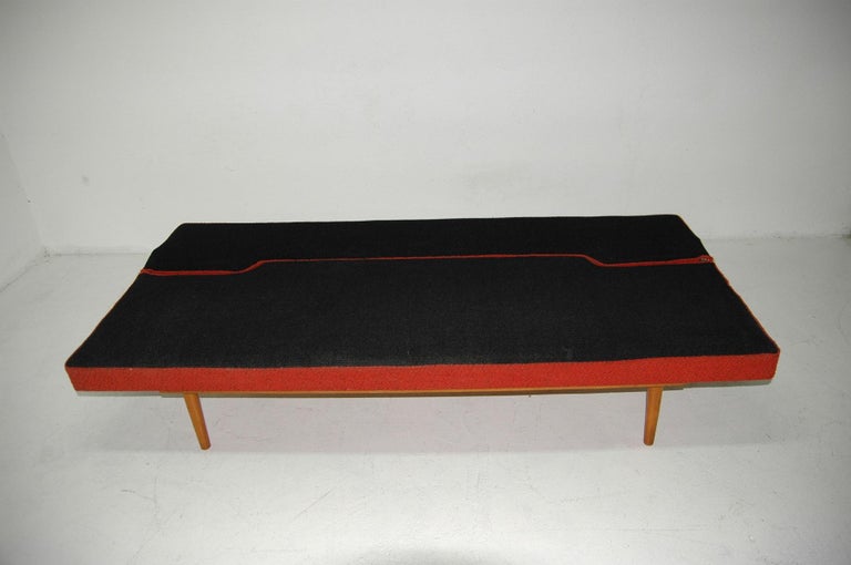 Midcentury adjustable sofa-bench designed by the Czech famous designer Miroslav Navrátil in the 1960s. Made in Czechoslovakia. It features very attractive and simple design. Material: fabric, beechwood. It´s a typical example of Czechoslovak design
