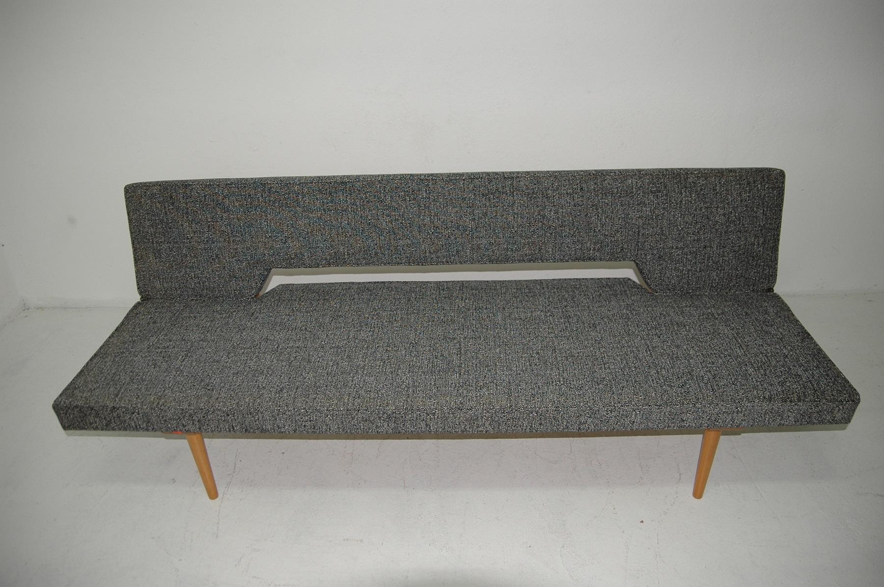 Midcentury adjustable sofa-bench designed by the Czech famous designer Miroslav Navrátil in the 1960s. Made in Czechoslovakia. It features very attractive and simple design. Material: fabric, beechwood. It´s a typical example of Czechoslovak design