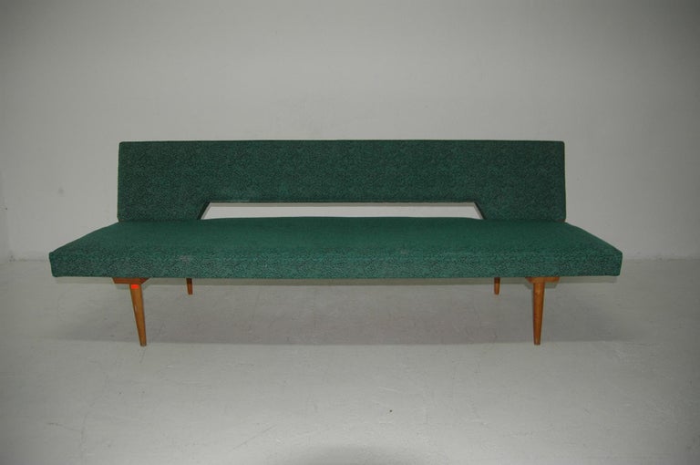 Midcentury adjustable sofa-bench designed by the Czech famous designer Miroslav Navrátil in the 1960s. Made in Czechoslovakia. It features very attractive and simple design. Material: fabric, beechwood. It´s a typical example of Czechoslovak design