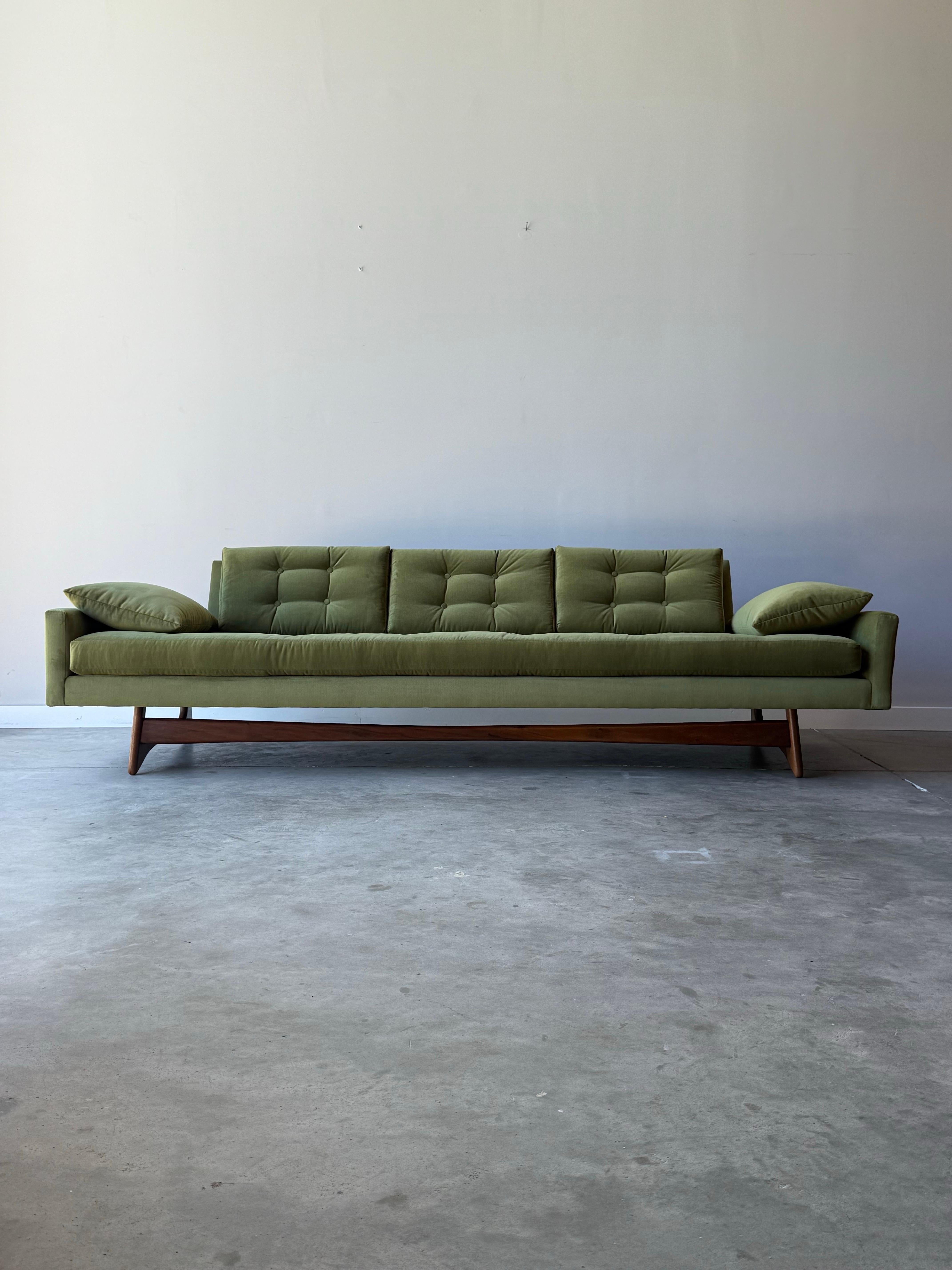 Mid-century model no. 2408-S sofa designed by Adrian Pearsall for Craft Associates, circa 1960s. An iconic mid-century retro sofa with a streamlined appearance and features classically Pearsall. Such as the long sculpted walnut base. The sofa seems