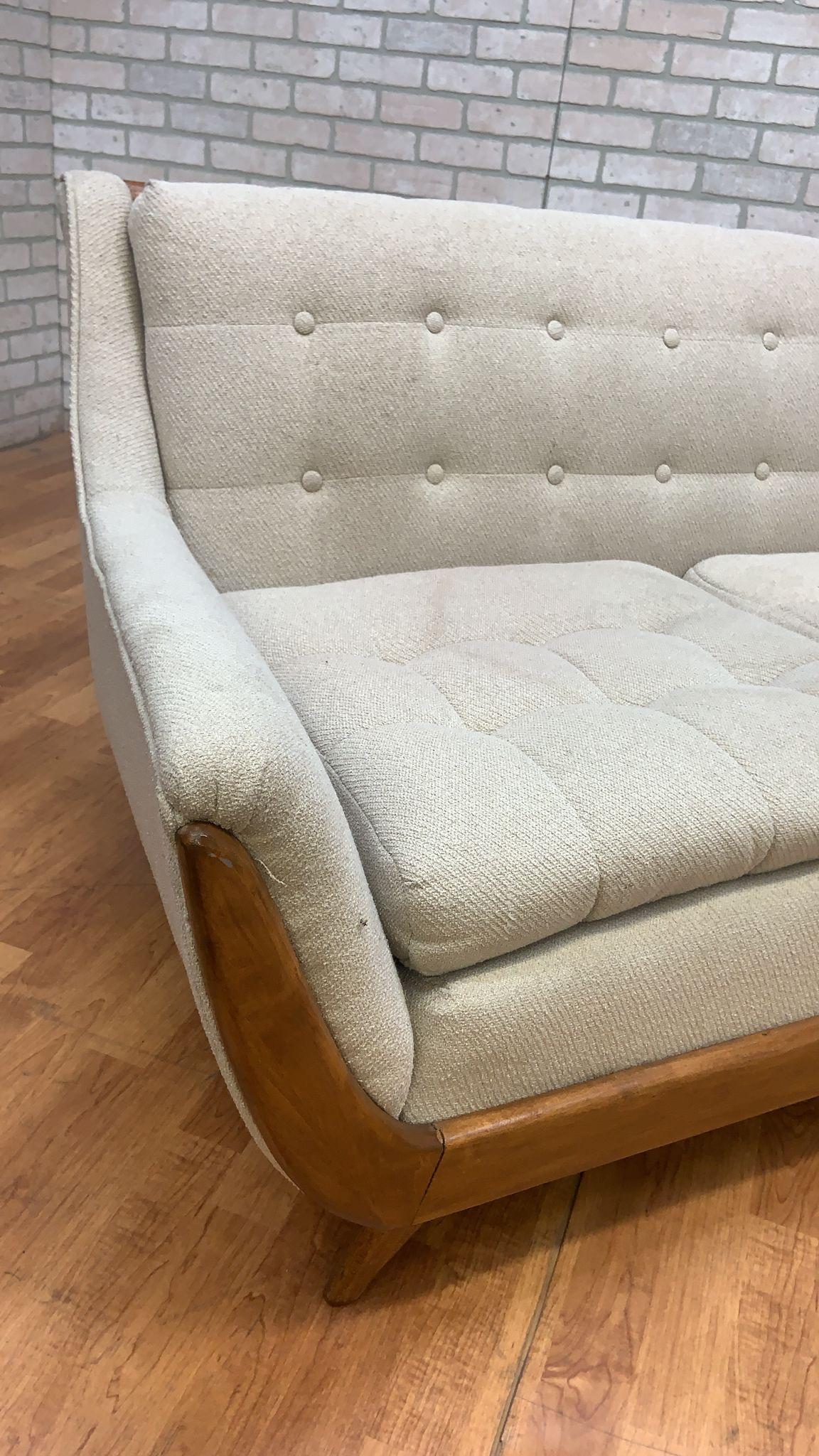 Mid Century Modern Adrian Pearsall Style Walnut Gondola Sofa and Club Chair - Set of 2

This amazing and study Adrian Pearsall Style gondola sofa and club chair set is on a walnut base. This sofa and chair set is being sold in its original condition