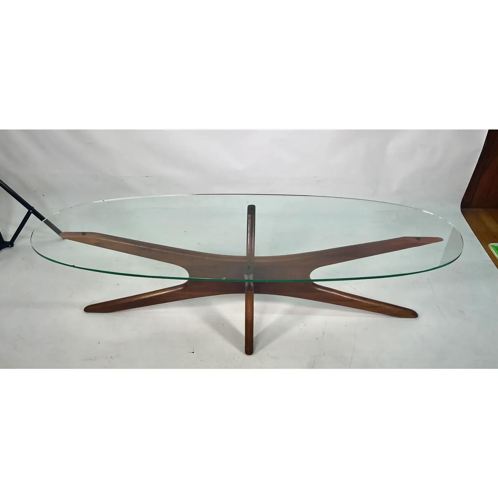 This Adrian Pearsall walnut “Jacks” coffee table is instantly recognizable and at this point iconic. This table is perfect if you’re looking to add a dash of elegance to your home or office.
