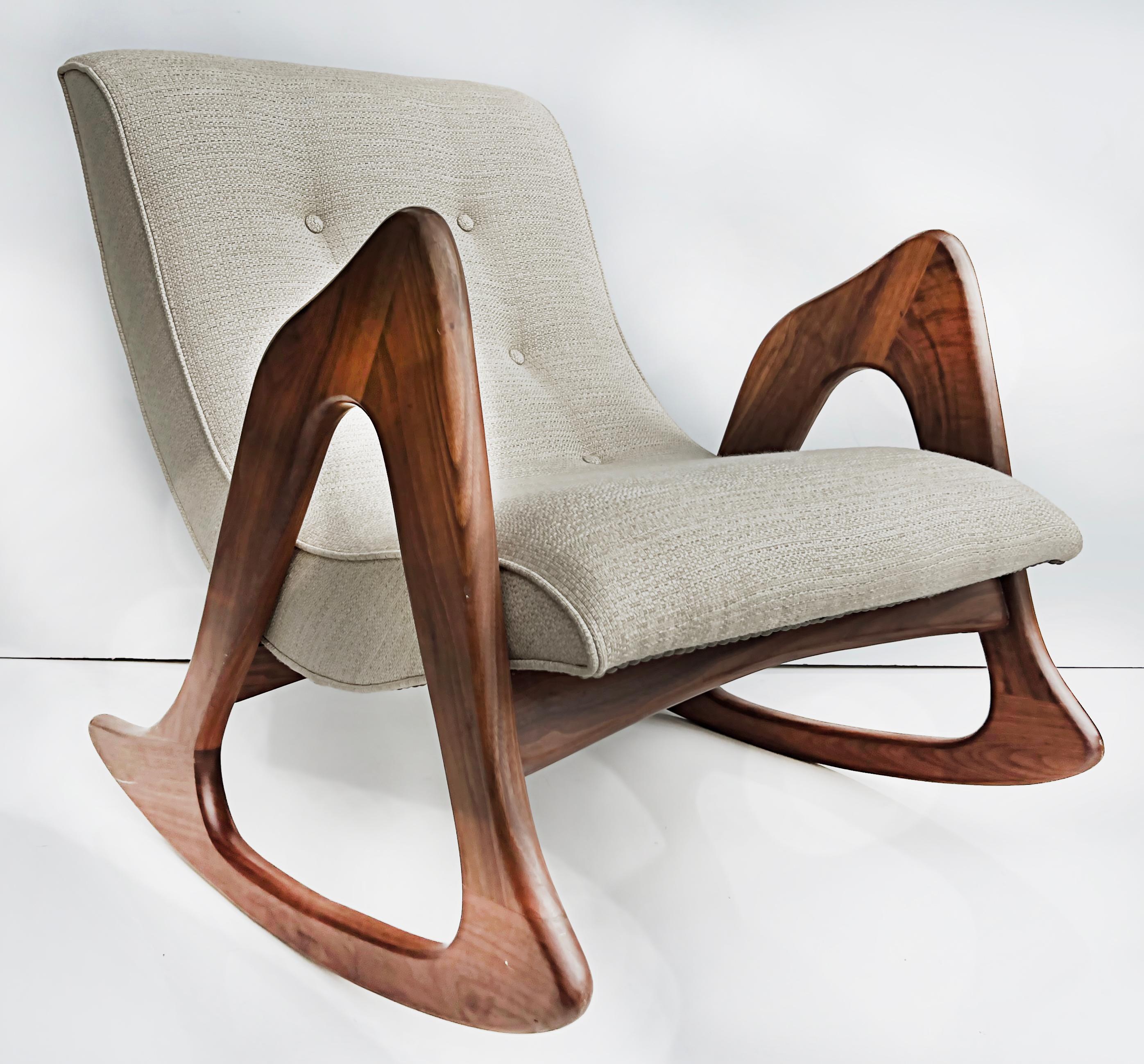 Midcentury Adrian Pearsall walnut rocking chair, Craft Associates

Offered for sale is a midcentury Adrian Pearsall rocking chair for Craft Associates. This rare walnut rocking chair has been completely redone to best feature its sculptural
