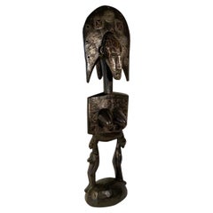 Mid-Century African Janus Shaped Black Wooden Sculpture with Brass Inlays