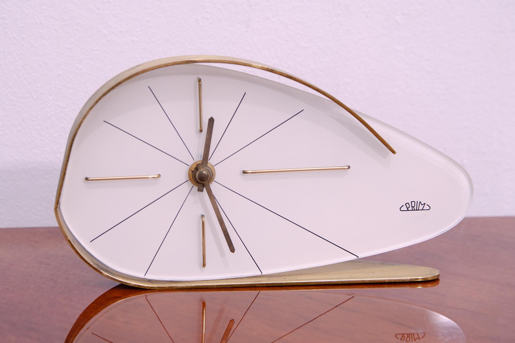 Mid century alarm clock, made in Czechoslovakia by the Prim company in the 1960s. Made in the so-called Brussels style, named after the Brussels EXPO in 1958. This piece is a typical example of this period. In very good condition, fully functional,