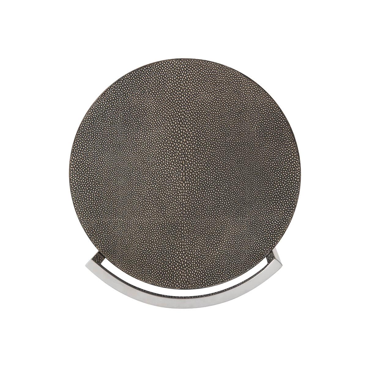 With a circular suspended faux shagreen wrapped top in a dark tempest finish supported by a slender nickel finish base.

Dimensions: 12