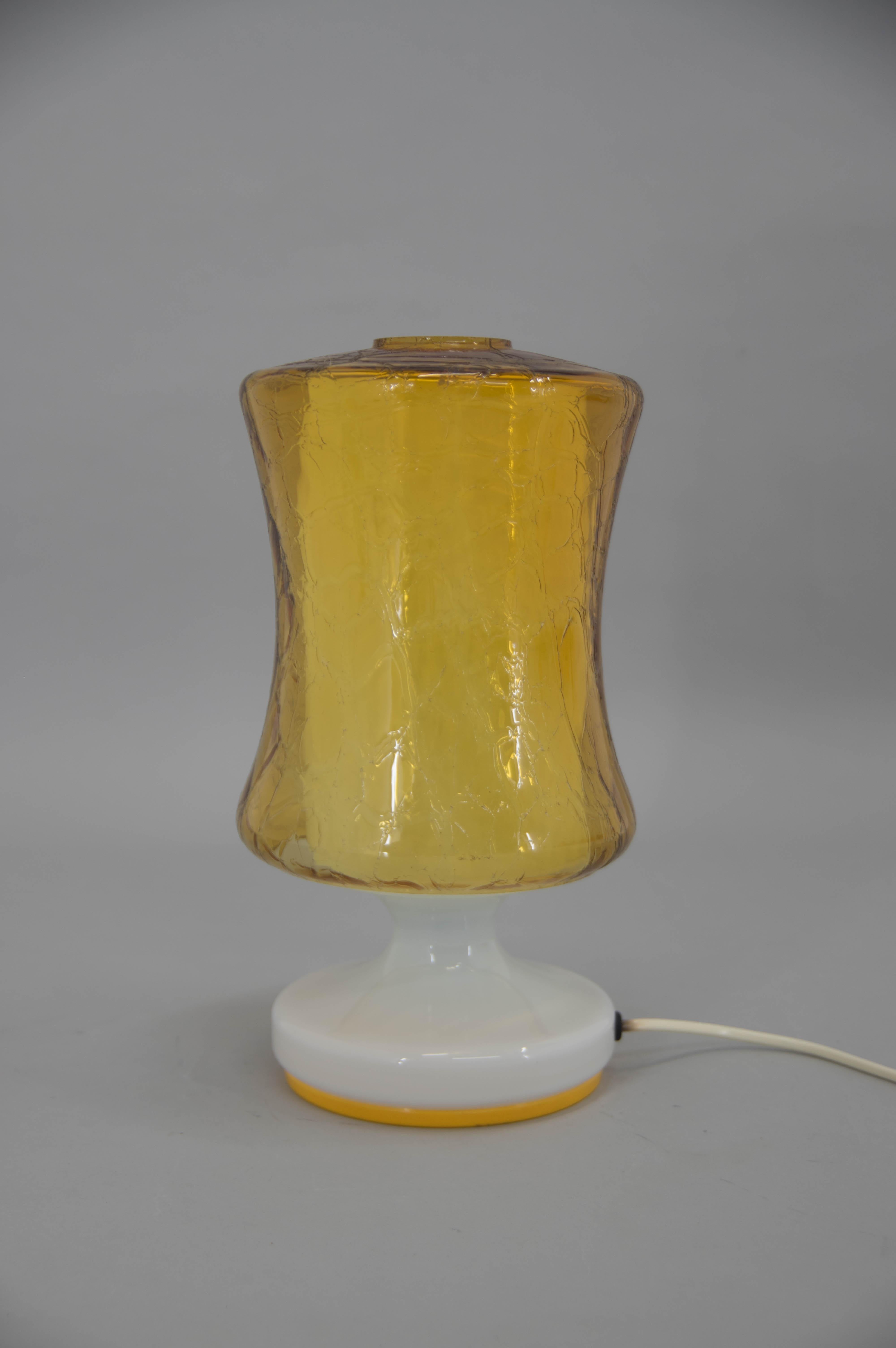 Made in Czechoslovakia in 1970s.
This table lamp consists of two glass parts.
Very good original condition without any damage.
1x60W, E25-E27 bulb
US plug adapter included