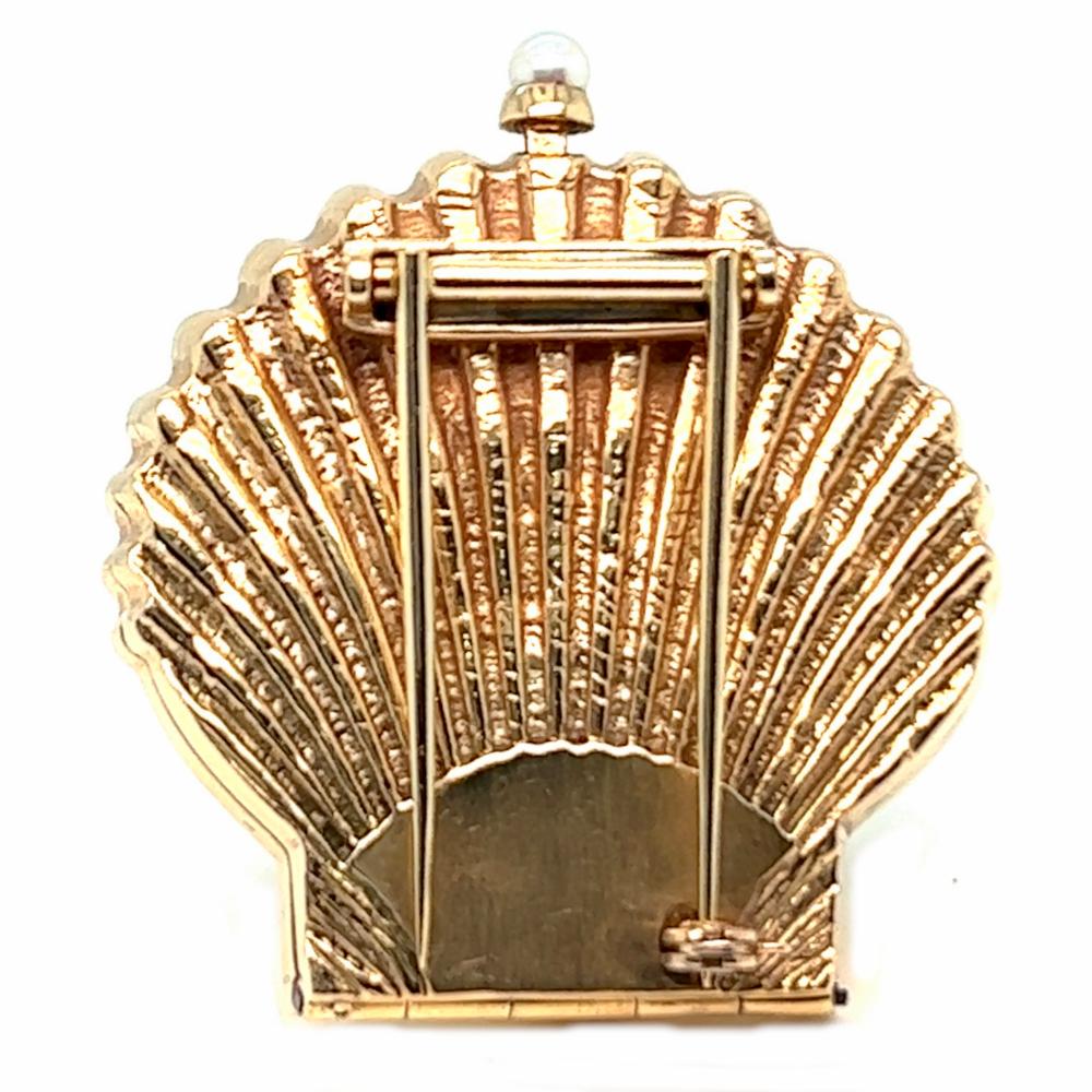 One Mid Century Alpina Pearl 14 Karat Yellow Gold Seashell Clock Brooch. Featuring one pearl. Crafted in 14 karat yellow gold signed Alpina with purity marks. Circa 1960. The brooch is 1 1/2 inches in length by 1 1/2 inches in width.

About this