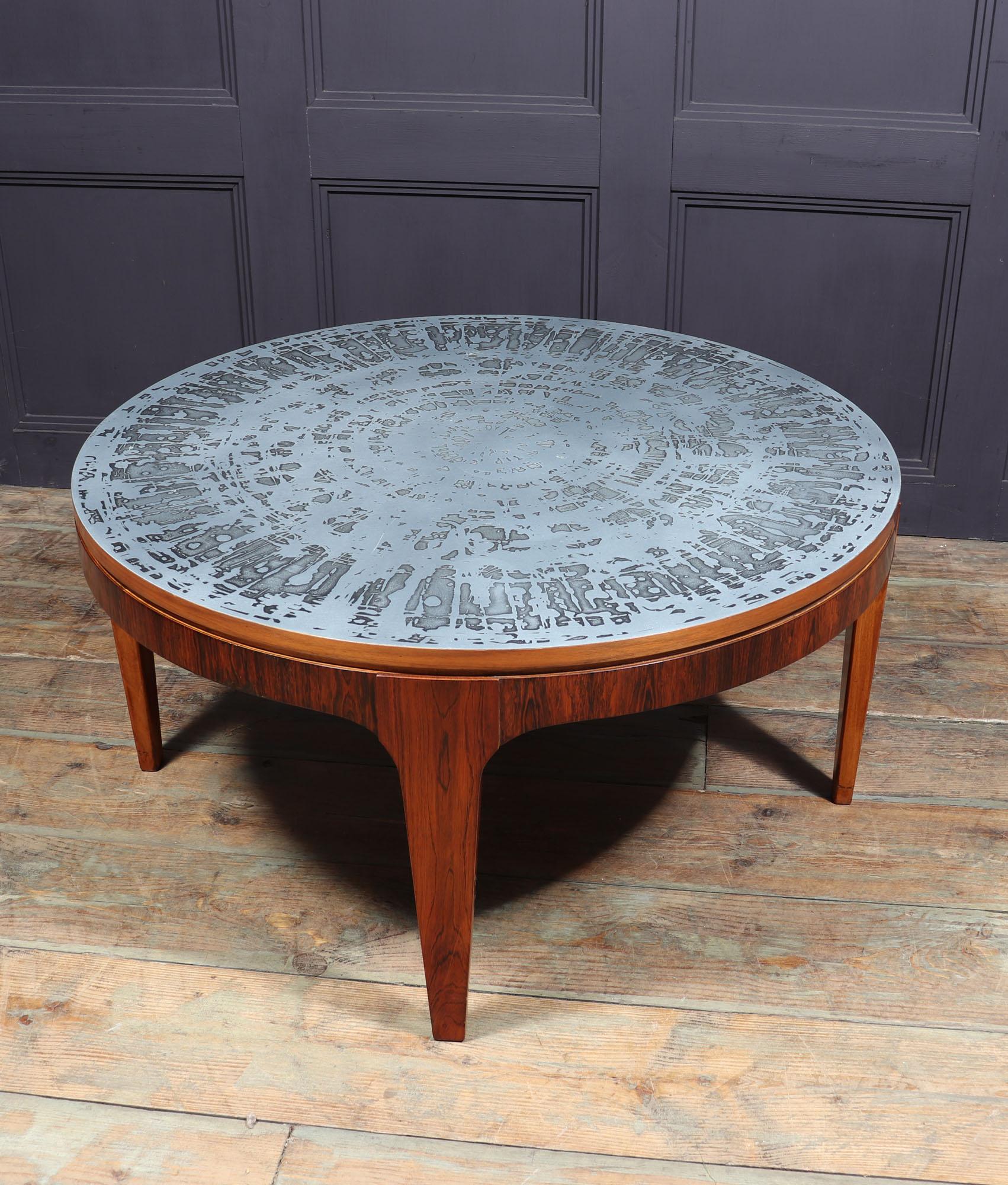 A very stylish Rosewood Scandinavian coffee table with acid etched aluminium top with four legs. The wood has been re finished and the table is in very good condition throughout

Age: c1960

Style: Mid-Century Modern 

Origin : Scandinavian