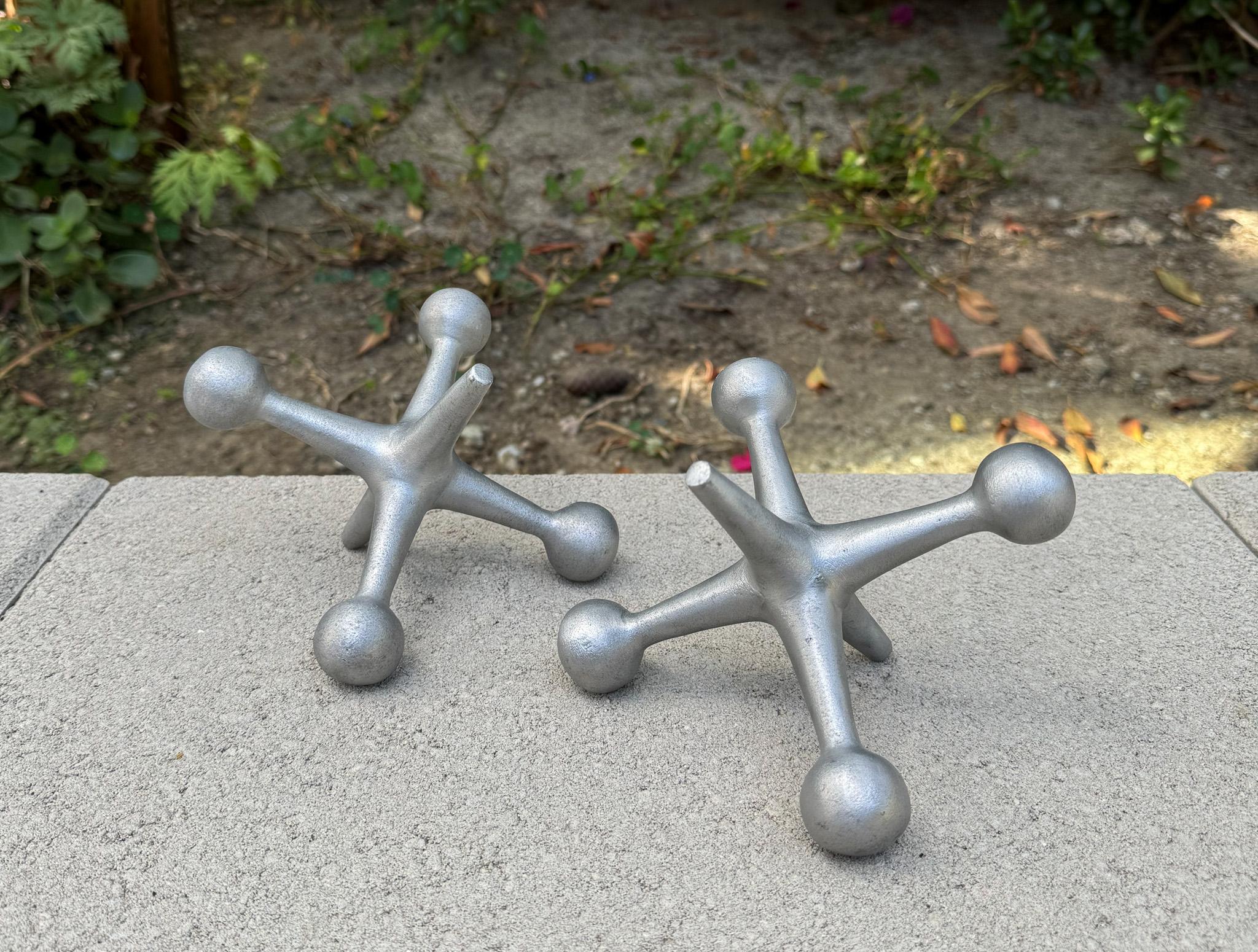 Cast Mid Century Aluminum Jacks / Jax Bookends For Sale