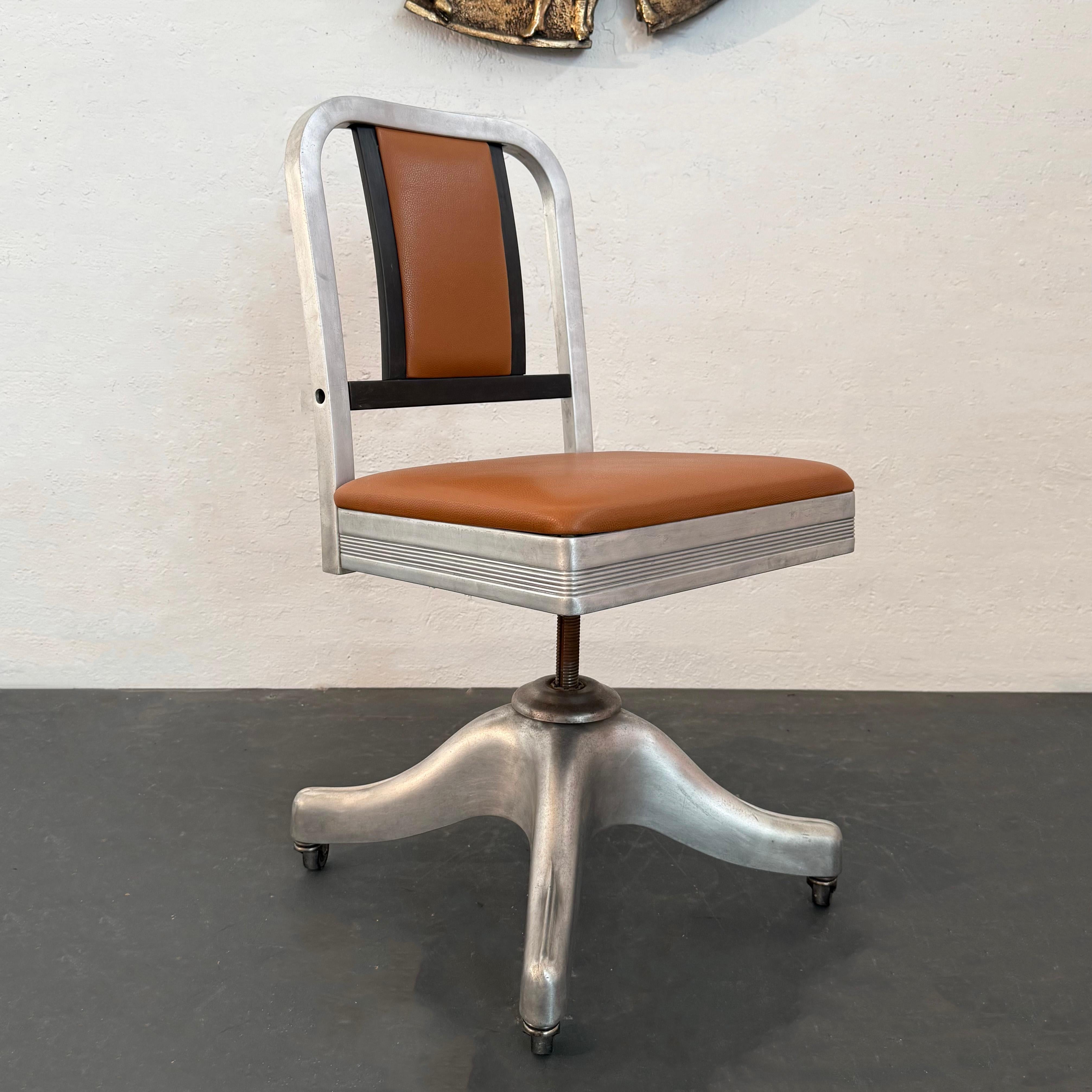 This classic rolling swivel office chair dates to the 1950s and was produced by the Shaw-Walker Co. The Shaw-Walker Company was an office-focused furniture company founded in 1822 that specialized in office chairs, desks, and filing cabinets. This