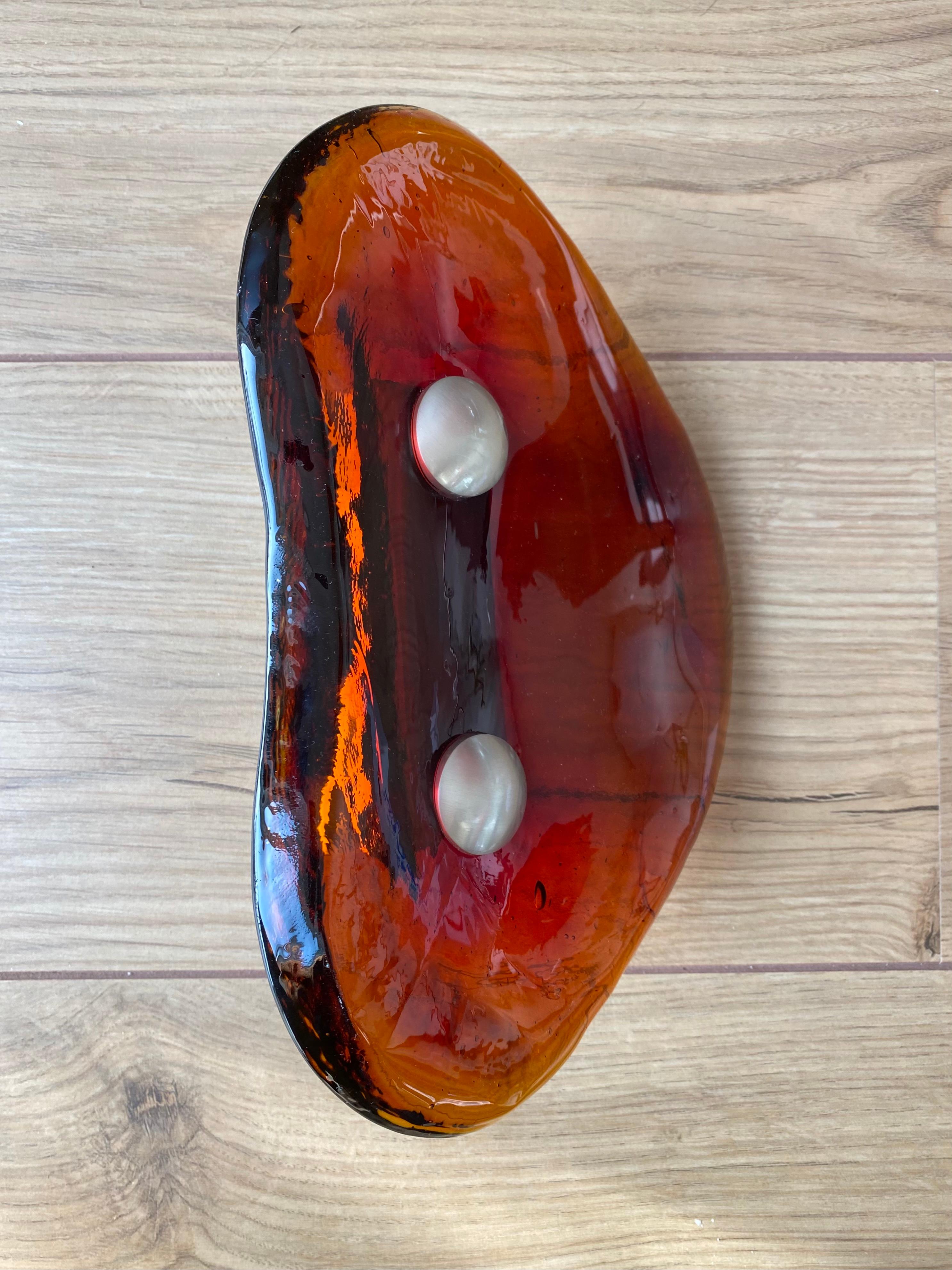 Absolut stunning piece made from thick, amber colored Murano or Art Glass. The metal part is imprinted ‘wss’. Rare European piece which is in very good condition. Would fit perfectly to the outside door of an excentrique house. Only minimal signs of