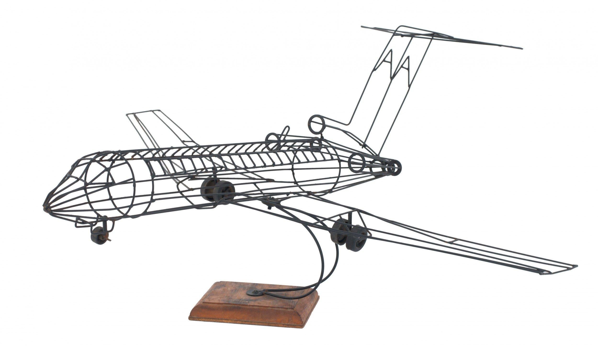 American mid-century (1960s) American Airlines wire jet plane sculpture on a square wooden base.