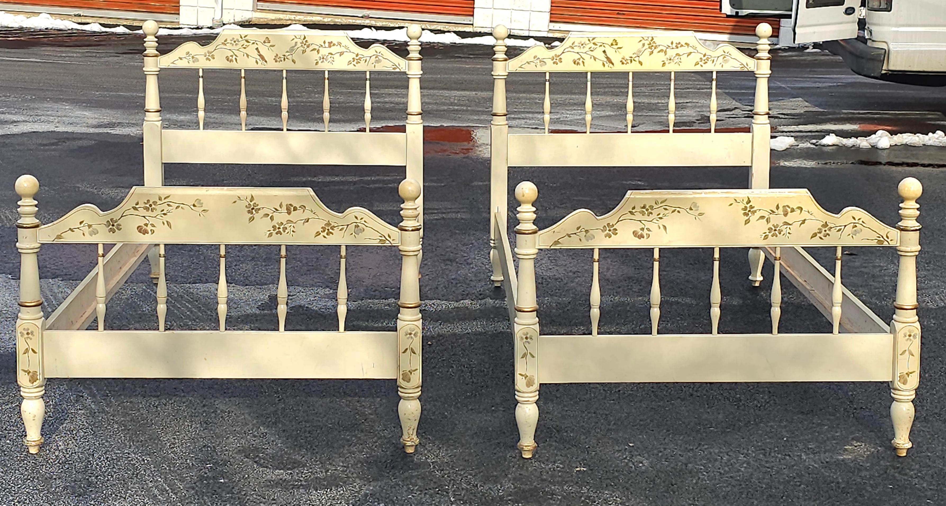A pair of Mid-Century American Classical Cream Painted and Decorated Maple Twin Beds. Measures 42.5