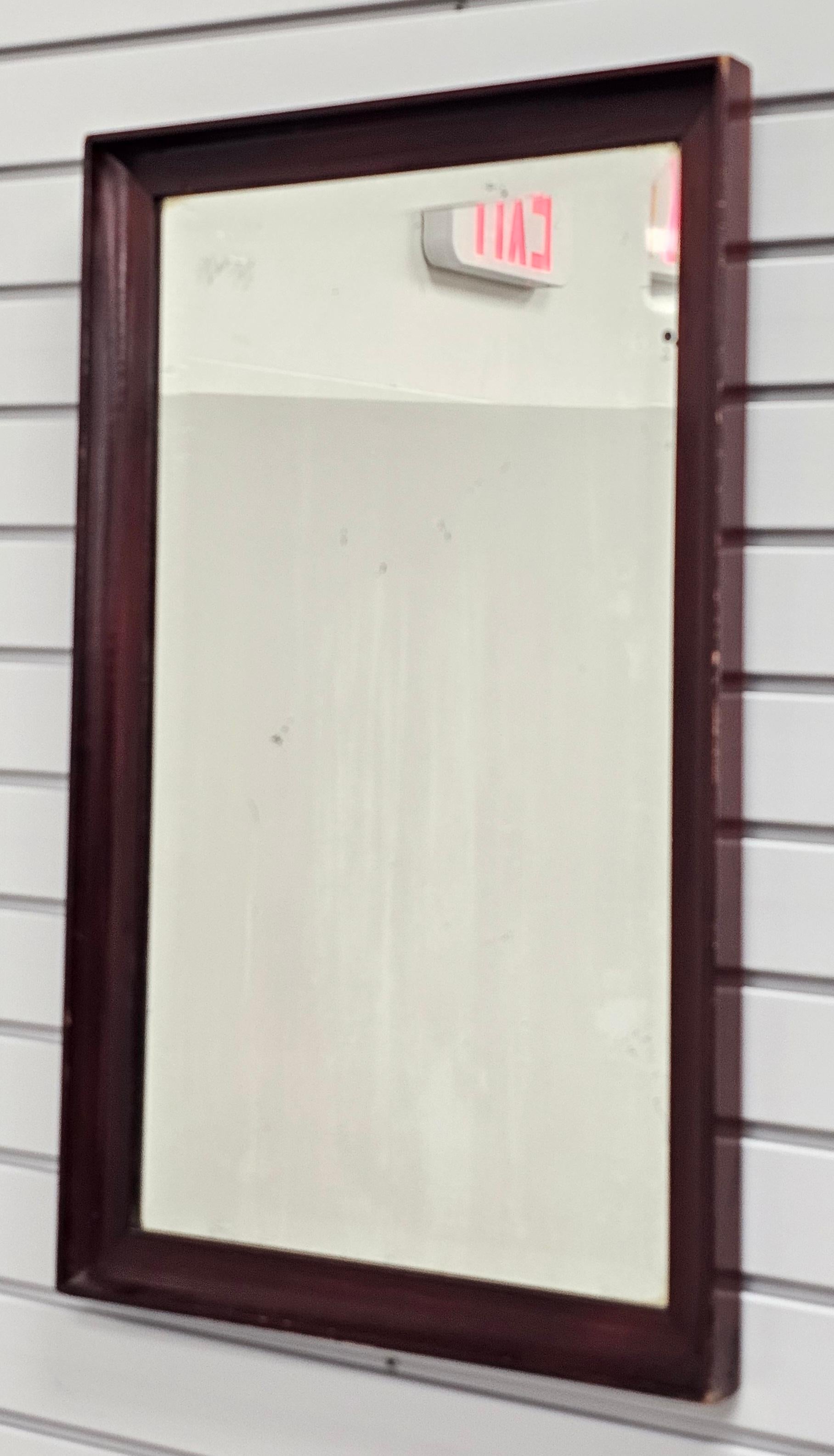 A Mid Century American Classical Solid Mahogany Frame Mirror. Measures 16.5: in width and 26.5