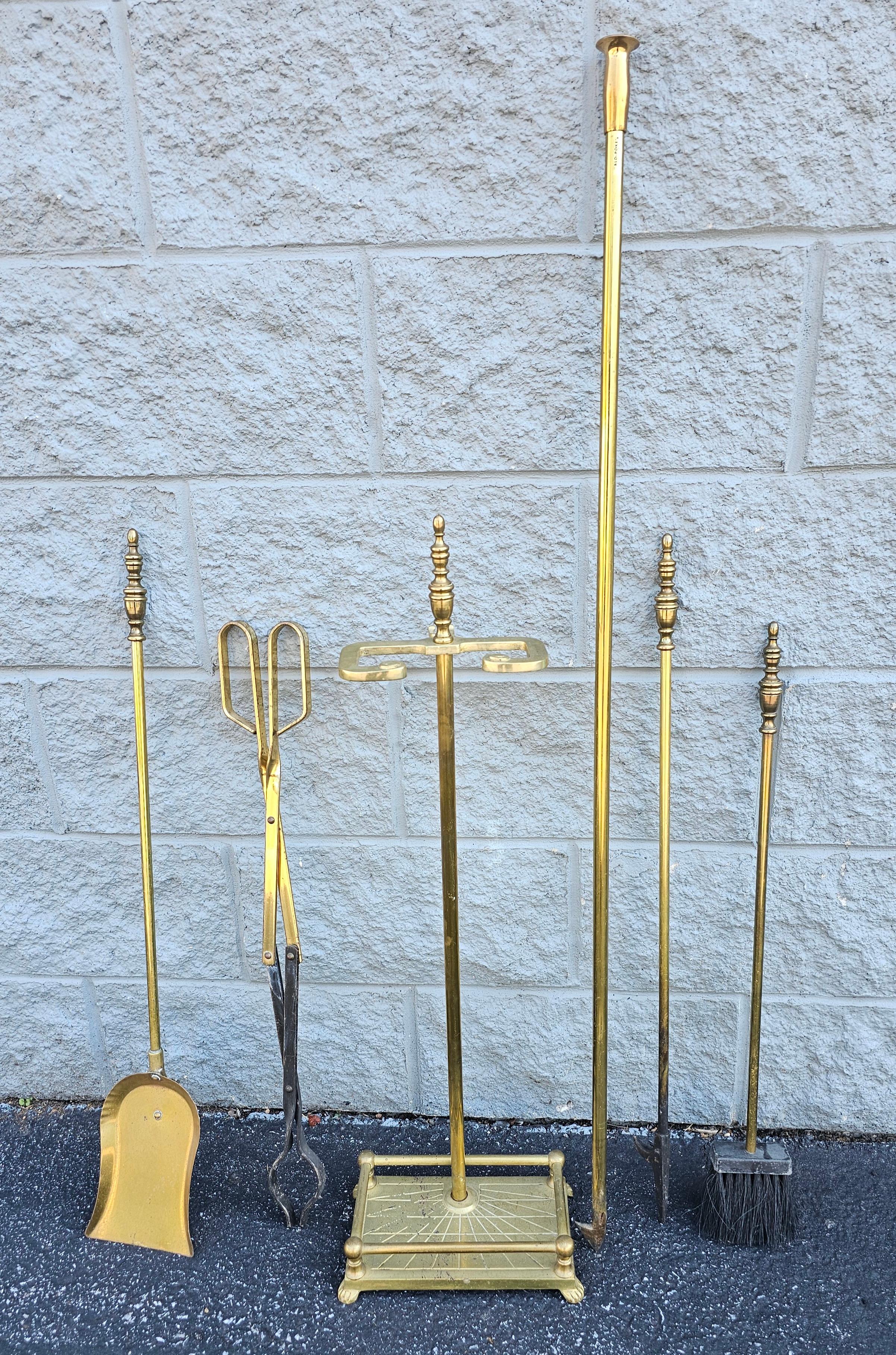 Six piece set Mid-Century American Federal Style Brass Fireplace Tools, include a 46.5'  Blo Poke tool.
Stand is 32