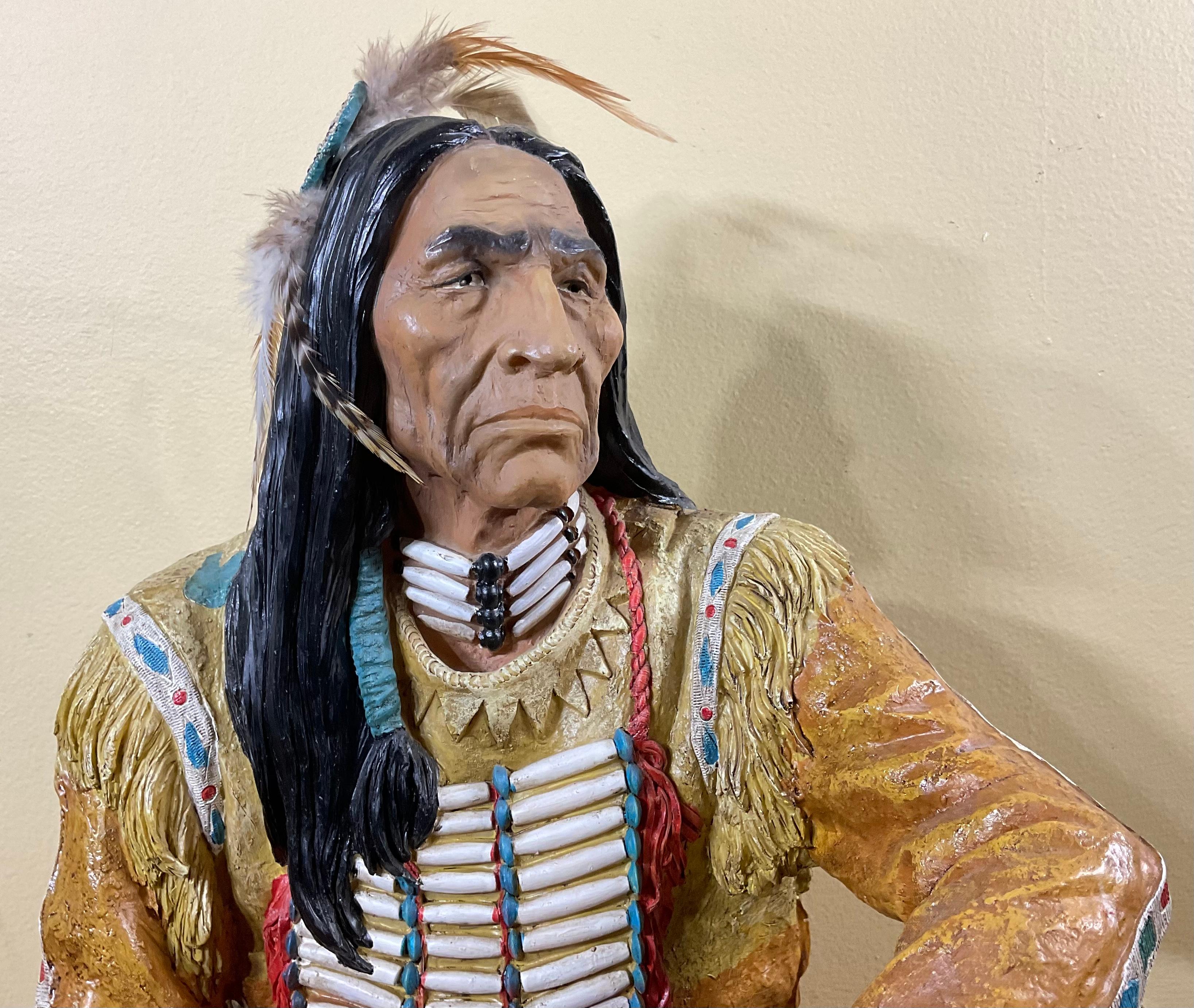 Beautiful vintage sculpture of American Indian chief artistically hand painted with 
Vibrant blue colors on vivid details.
Exceptional object of art for display.
