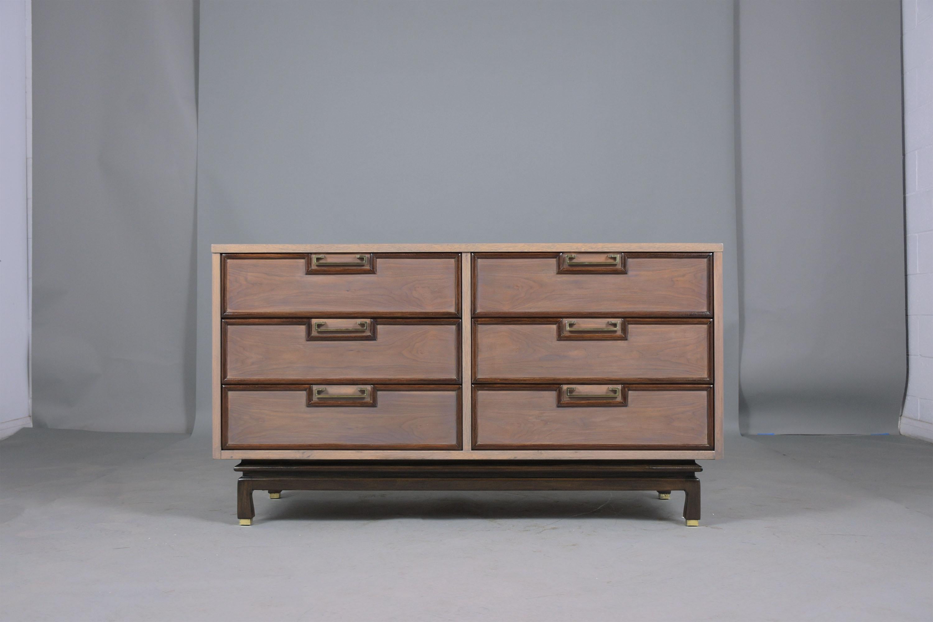 An extraordinary 1960's mid-century dresser hand-crafted out of walnut wood completed restored by our professional craftsmen team. This fabulous piece features a new light grey & brown color combination with a lacquer finish, six drawers with