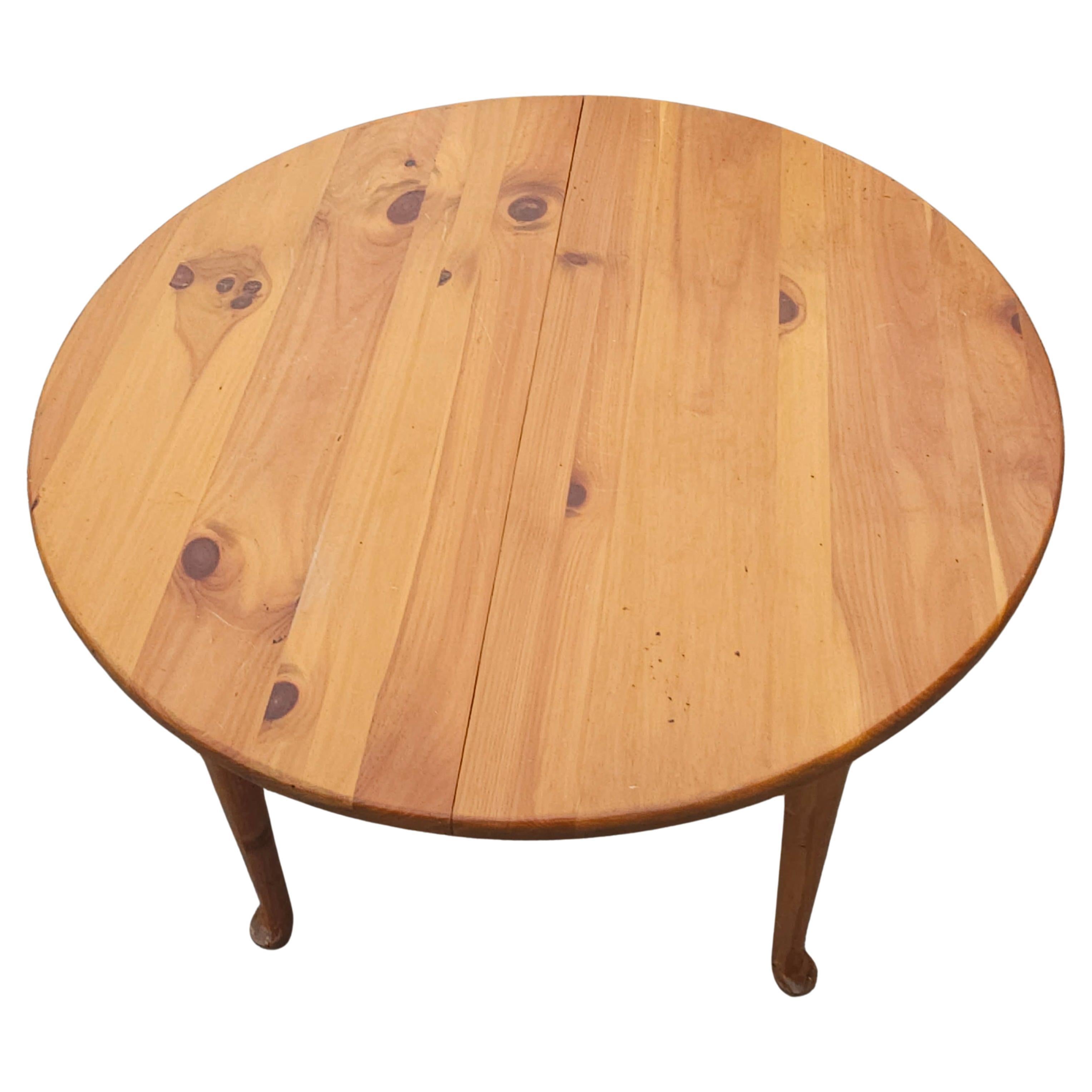 A Mid Century American Pine Extension Breakfast Table with Queen Anne feet. Measures 42