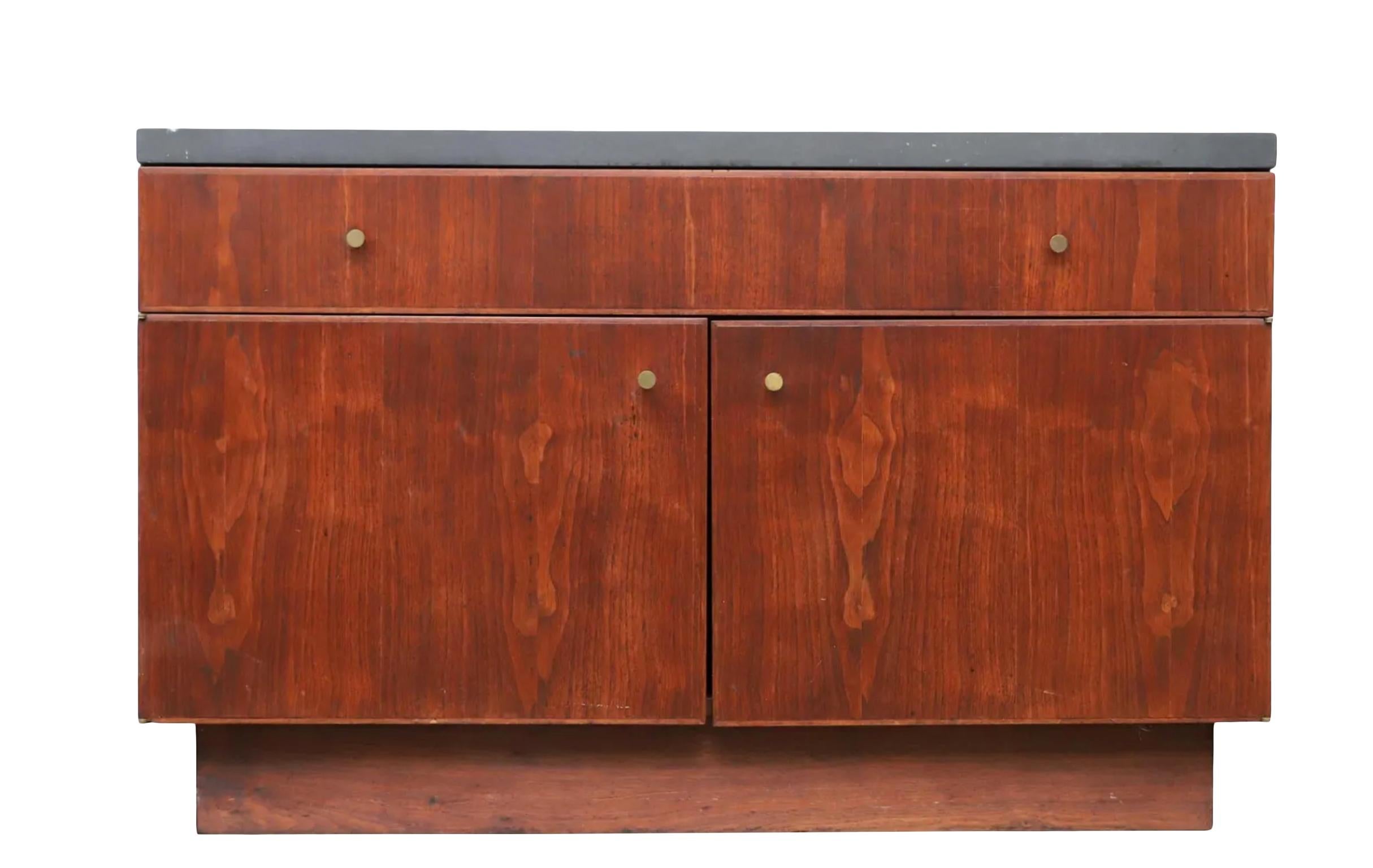 Mid century American Studio craft thick slate top black walnut credenza cabinet. beautiful hand crafted solid black walnut single drawer cabinet. Has 2 Lower doors with Brass Knobs lower area is wide open no shelves - great for storage. Has 1.25