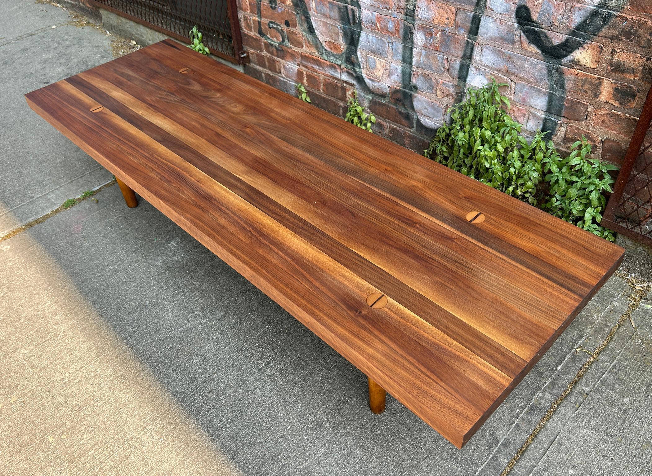 Great midcentury American Studio Craft Arts solid beautiful Hardwood & walnut Long Coffee table or bench . Gorgeous black walnut joined sections on solid Ash wood turned legs with highly crafted joinery. Made circa 1960. Located In Brooklyn NYC

15