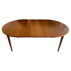 Mid century American walnut round dining table with 2 leaves 