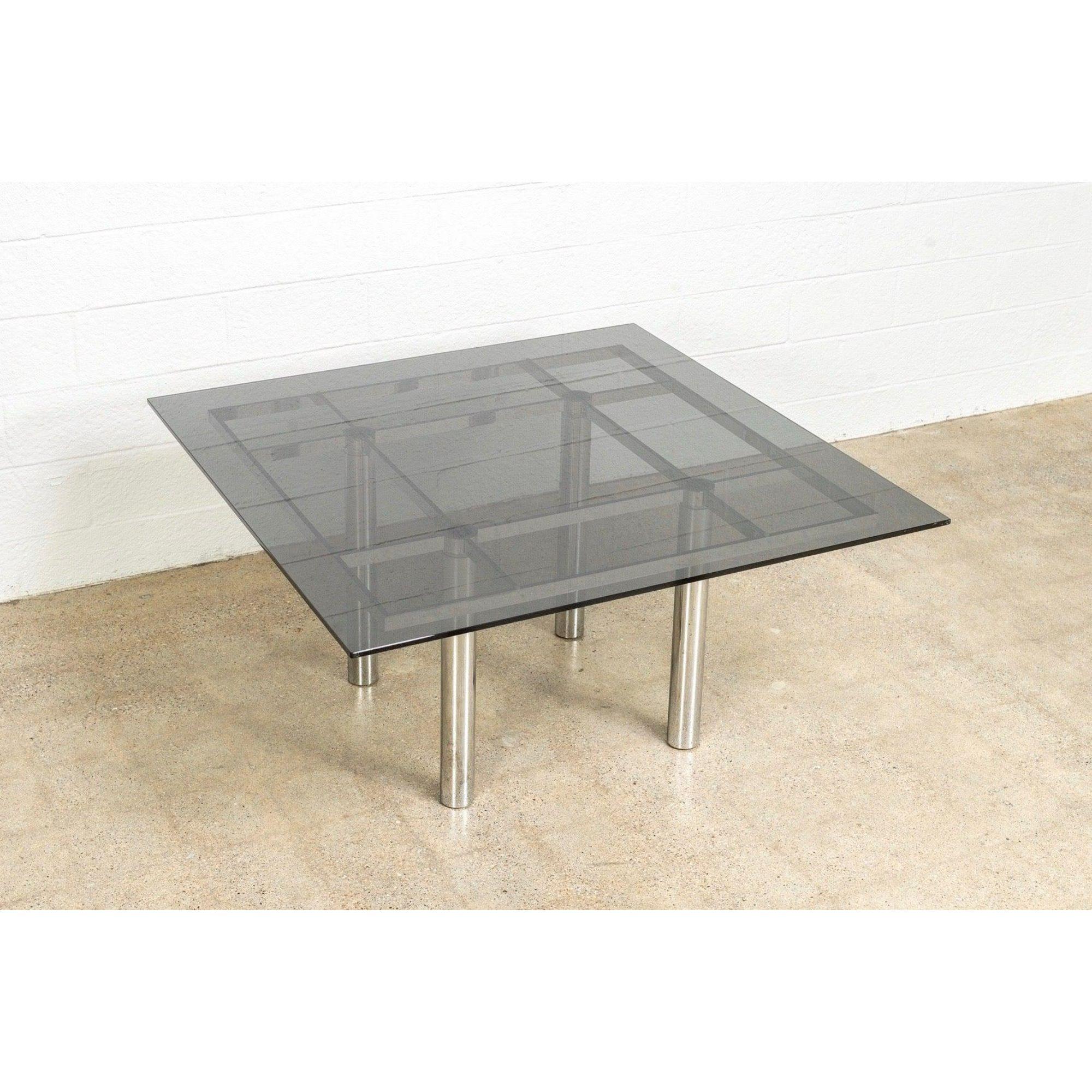 This mid century modernist “Andre” square glass and chrome table designed by Tobia Scarpa for Knoll International is circa 1970. The table is heavy and solid and exceptionally crafted from premium materials. The sleek design has a clean minimalist