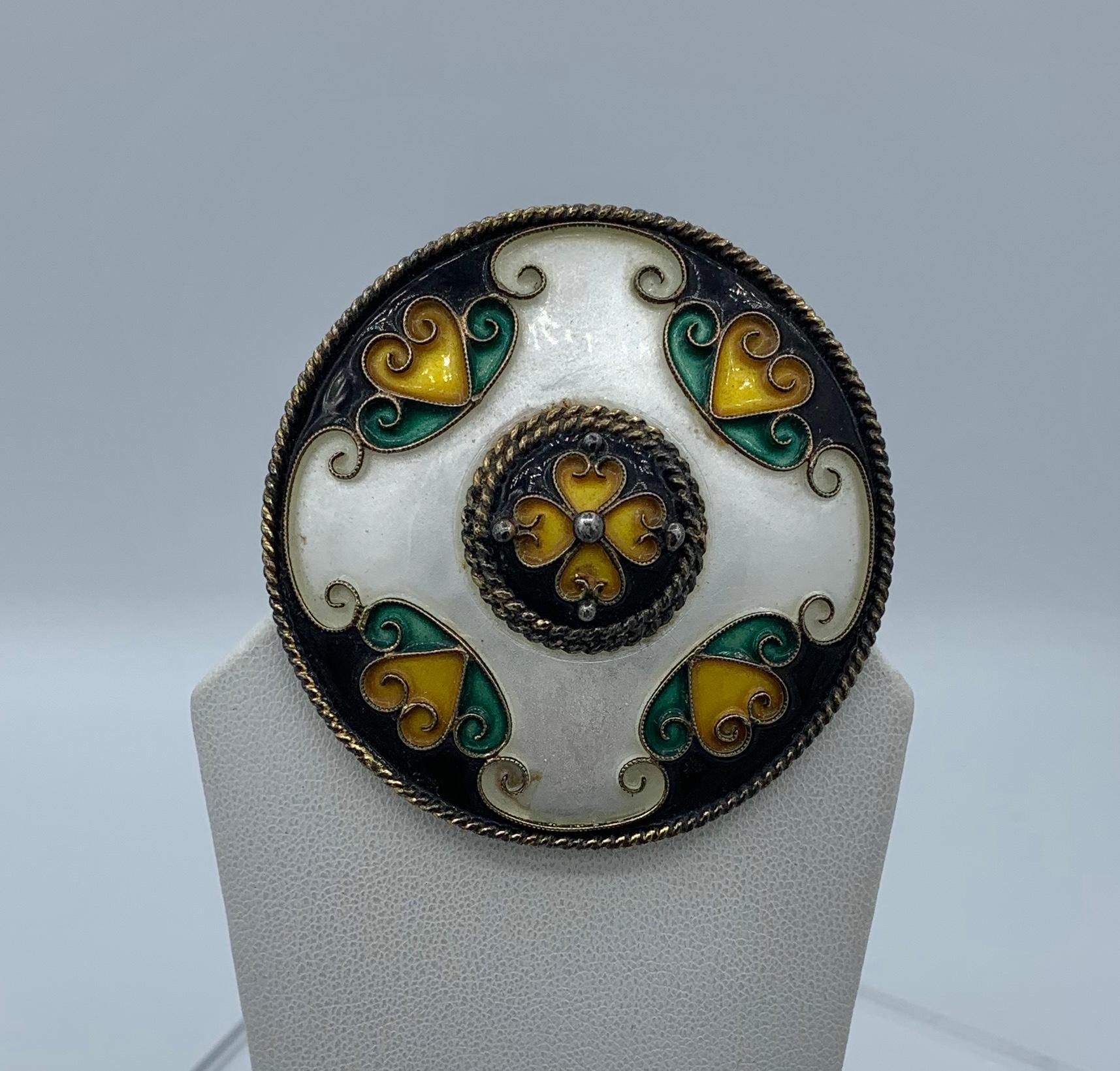 This is a wonderful Mid-Century Modern Sterling Silver Enamel Brooch by the esteemed Norwegian maker Andresen & Scheinpflug.  Pieces by Andresen and Scheinpflug are rare and highly desirable as objects of Mid-Century Modern design. 
Their use of