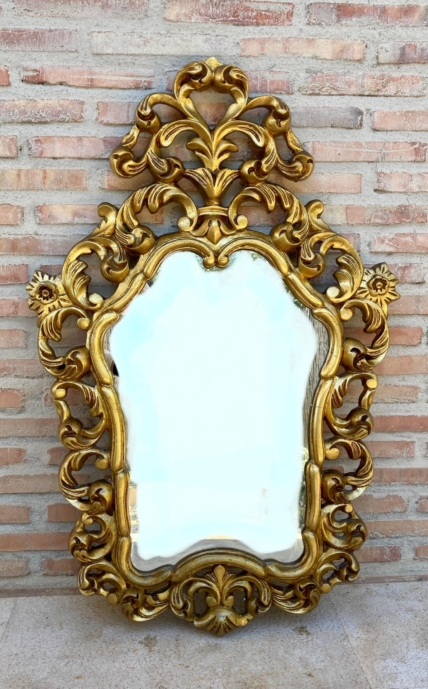 Antique gold cornucopia mirror. 
By unknown manufacturer from France, circa S.XX

In original condition, with minor wear consistent with age and use, preserving a beautiful patina.
 