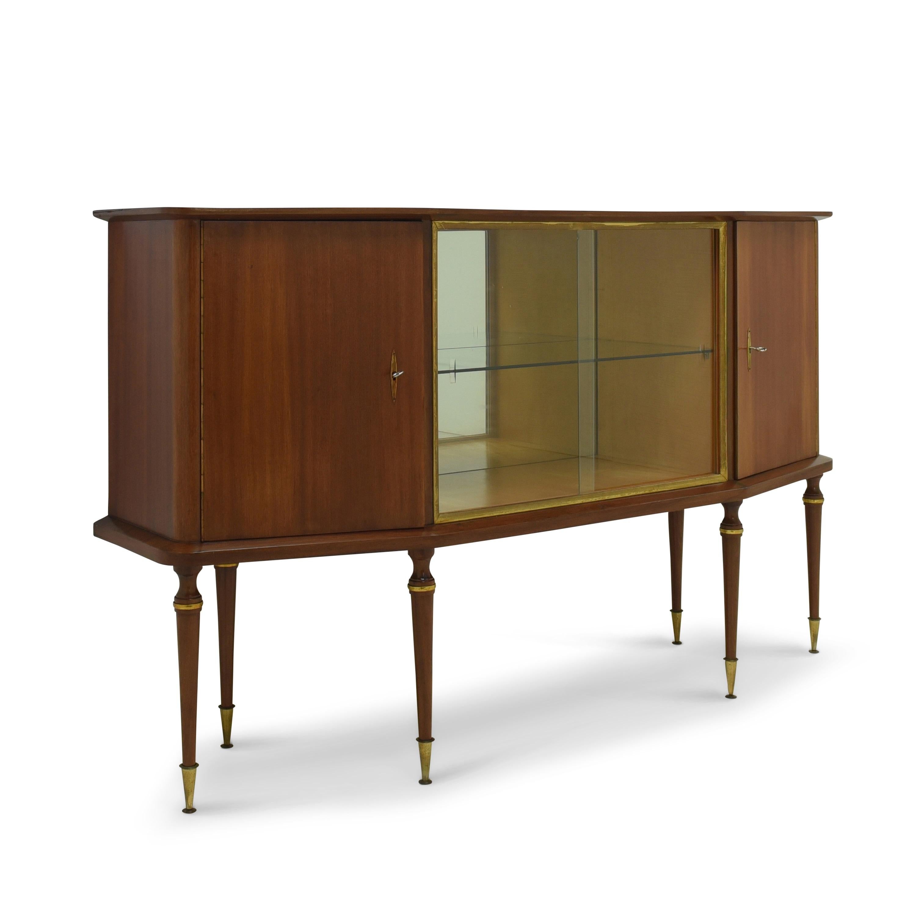 Mid-century display cabinet sideboard restored circa 1960 sideboard antique retro Art Deco

Features:
Display case mirrored on the back with two sliding doors
Outer doors with original espagnolette locks
Brass-plated metal elements
Original