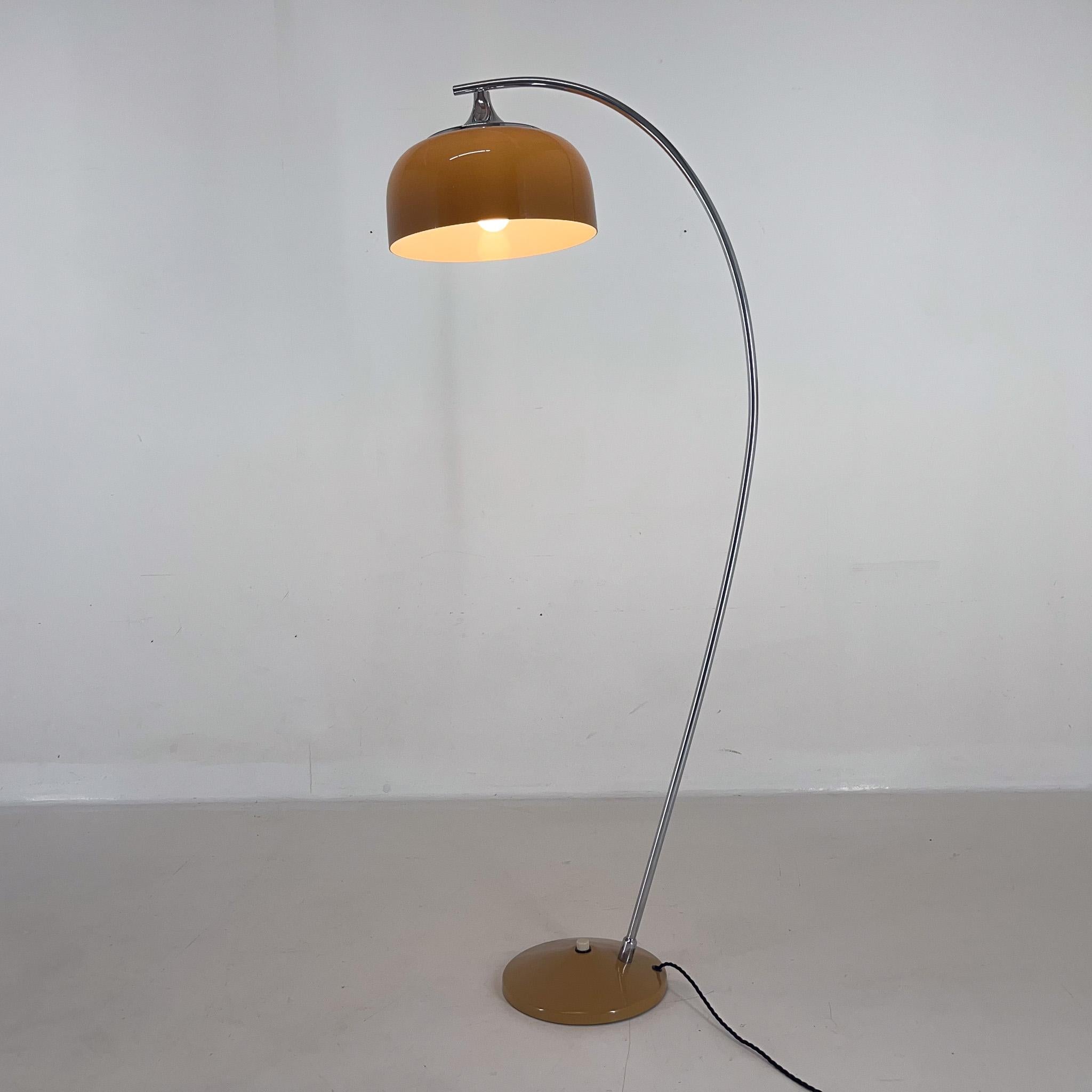 Vintage arch floor lamp produced in formeer Czechoslovakia in the 1960's. Made of chrome, metal and plastic. The lamp has been restored. 
Bulb: 1 x E26-E27. 
US plug adapter included.