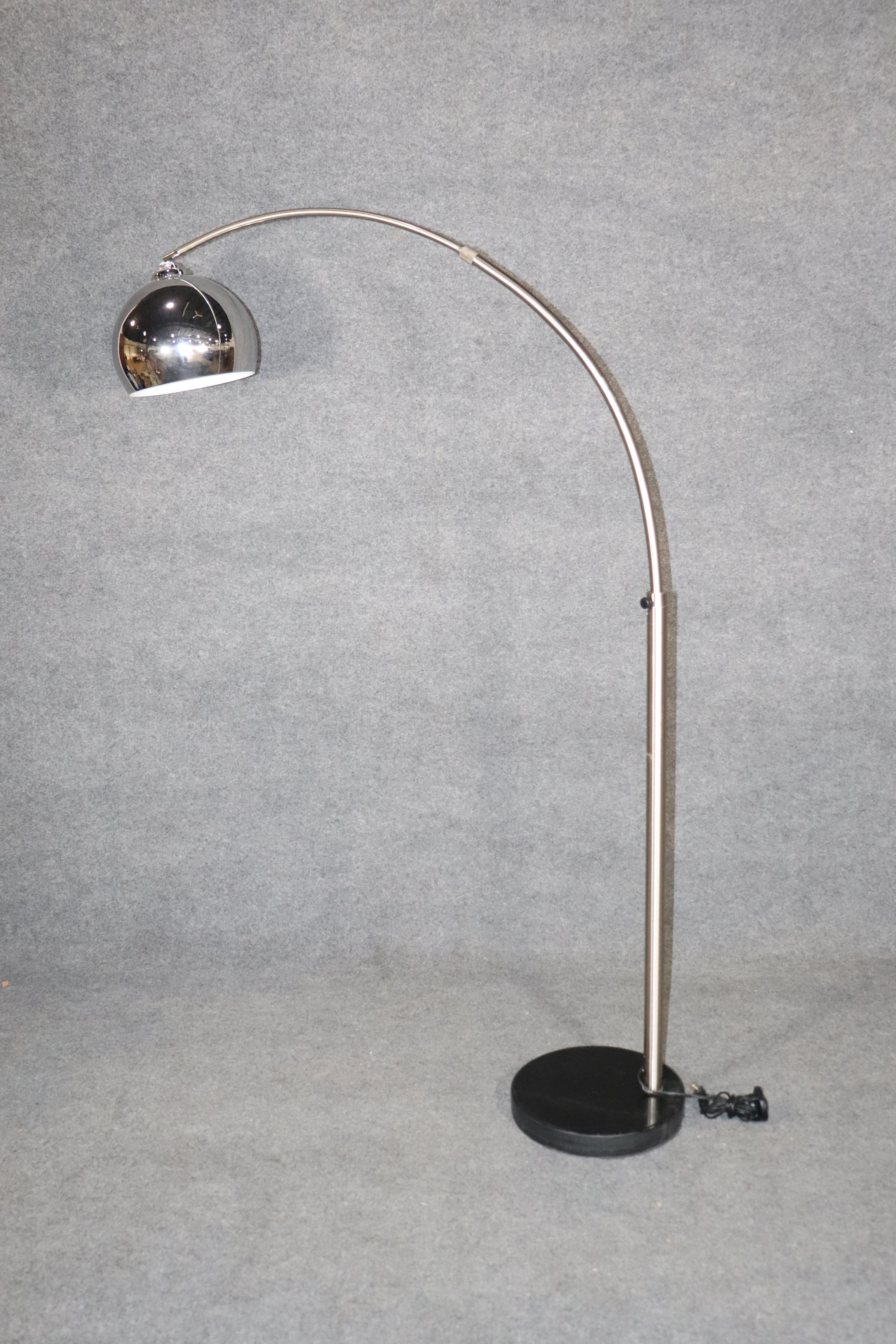 Vintage midcentury arc lamp in polished chrome finish. Adjustable length for use over your sofa.
Please confirm location NY or NJ.
