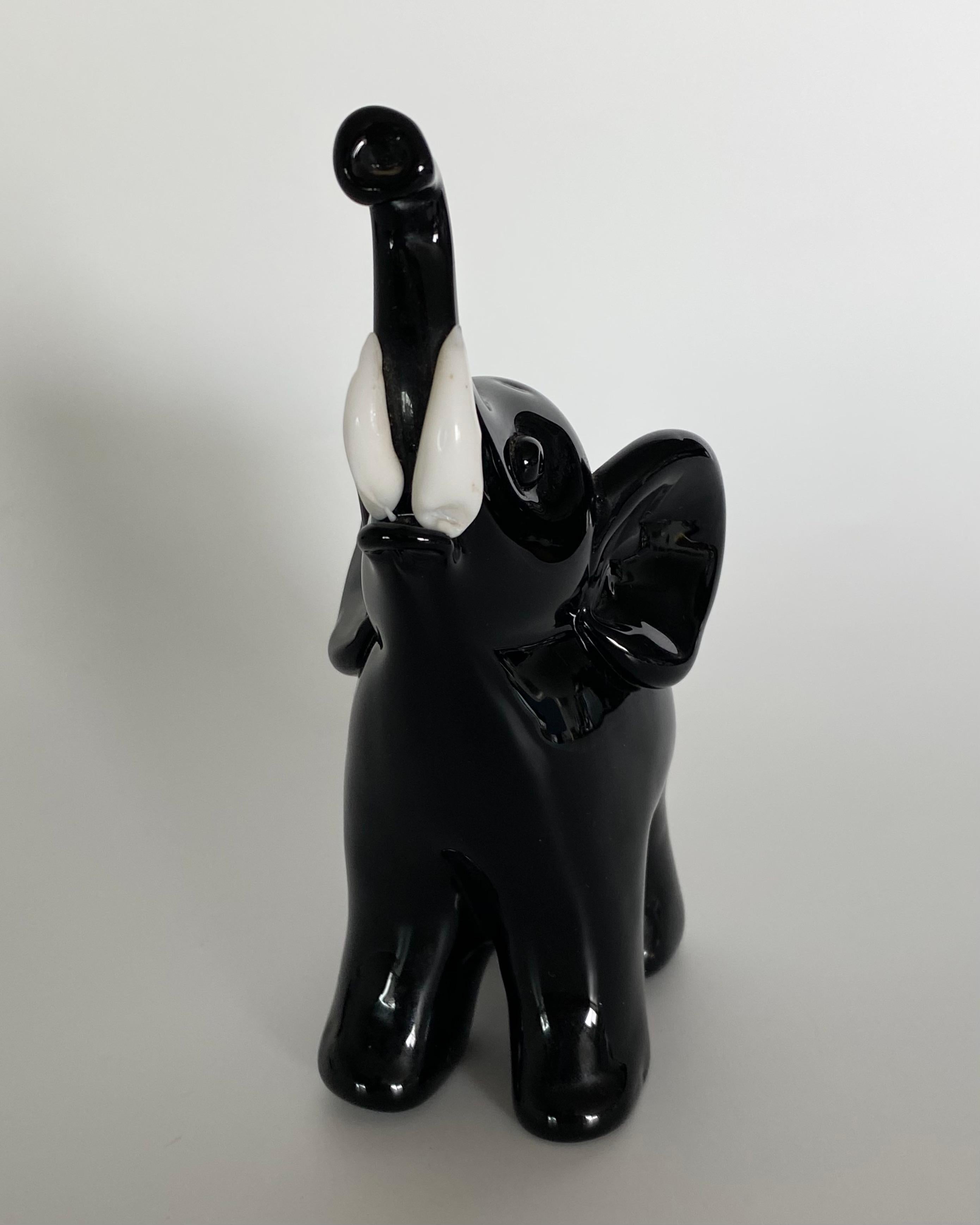 Seldom seen model of an adolescent elephant with tusks by Archimede Seguso produced in the mid 1950s. The figurine is a beautiful example of Segusos love for animals and his extraordinary skill to infuse his creations with emotion. The original