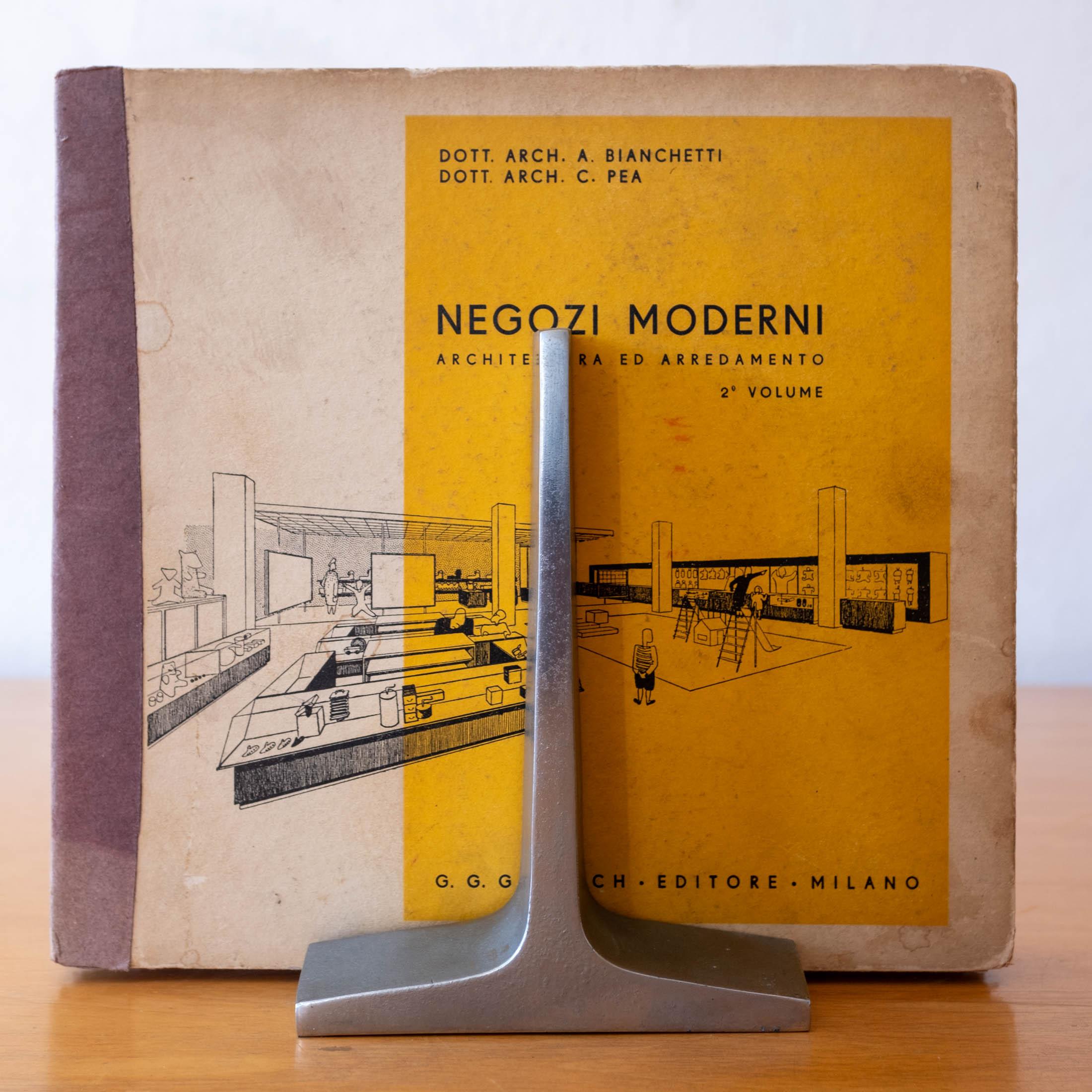 Sculptural bookends by Ben Seibel. Solid metal. Very architectural. 1960s
