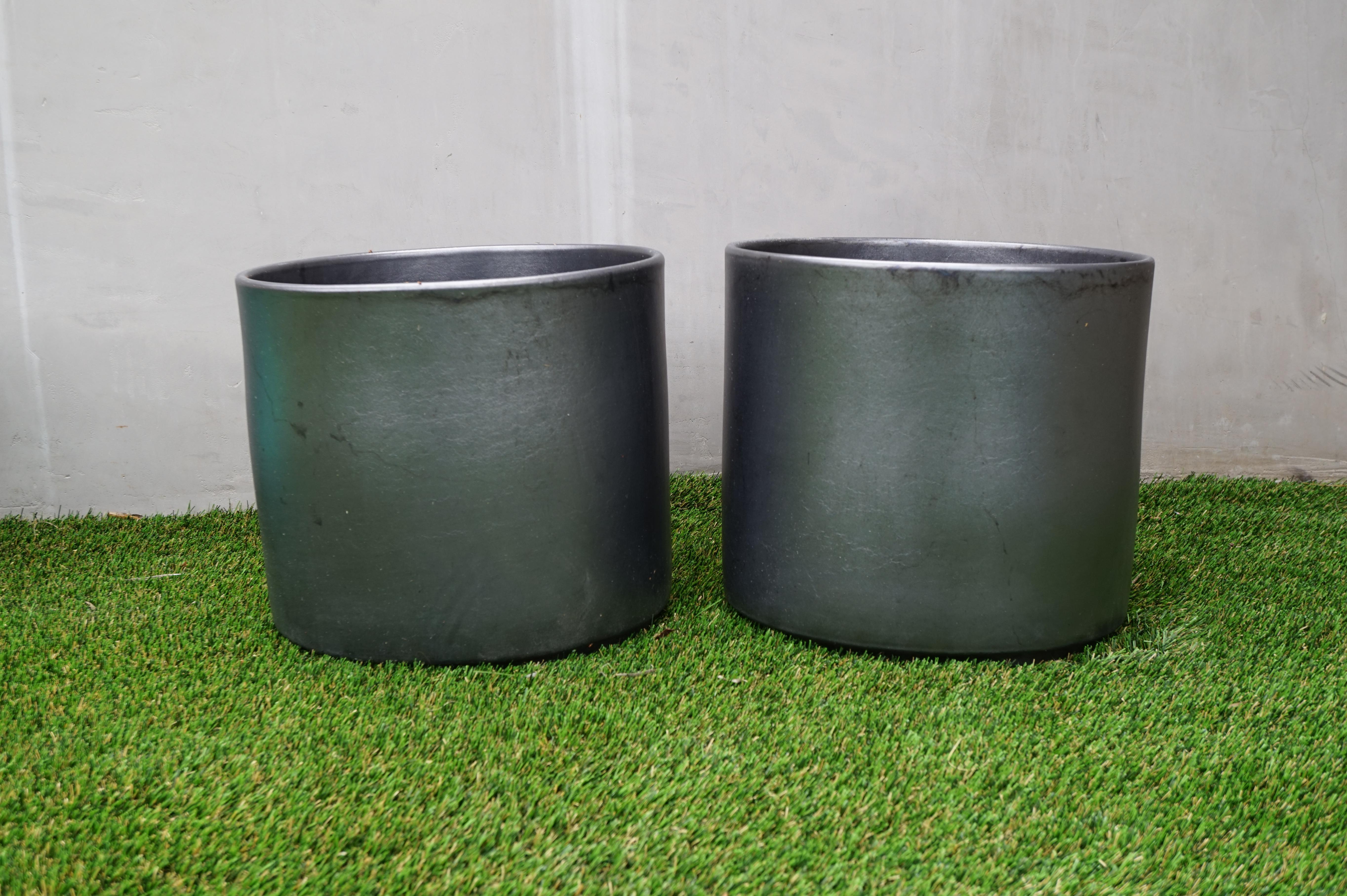 Set of two vintage MCM large gunmetal ceramic planter pots by Gainey

Each measures 13