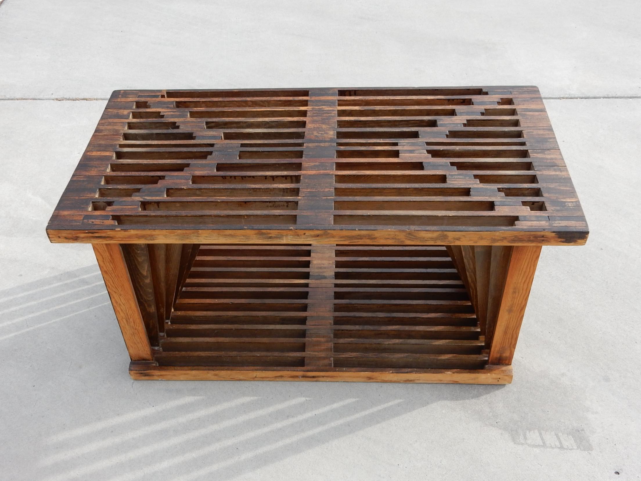 Incredible piece of 1950s California architectural design.
Thin slats of wood nailed together forming a coffee table or bench. 
It's a solid piece with no movement or wobble in the form.
Crudely done, not signed or marked. As found, completely