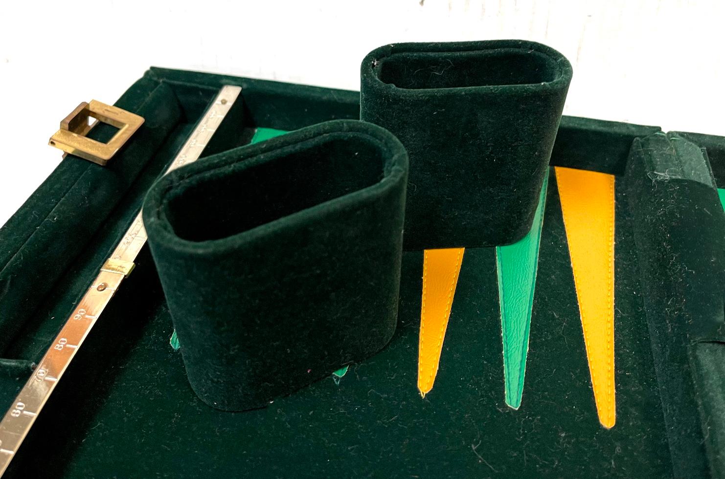 This is a mid-century traveling professional backgammon set by the renowned manufacturer, Aries. Aries was highly regarded for its leather quality. Even companies like Hermes used Aries leather. The company was based in Mexico and was sold in the