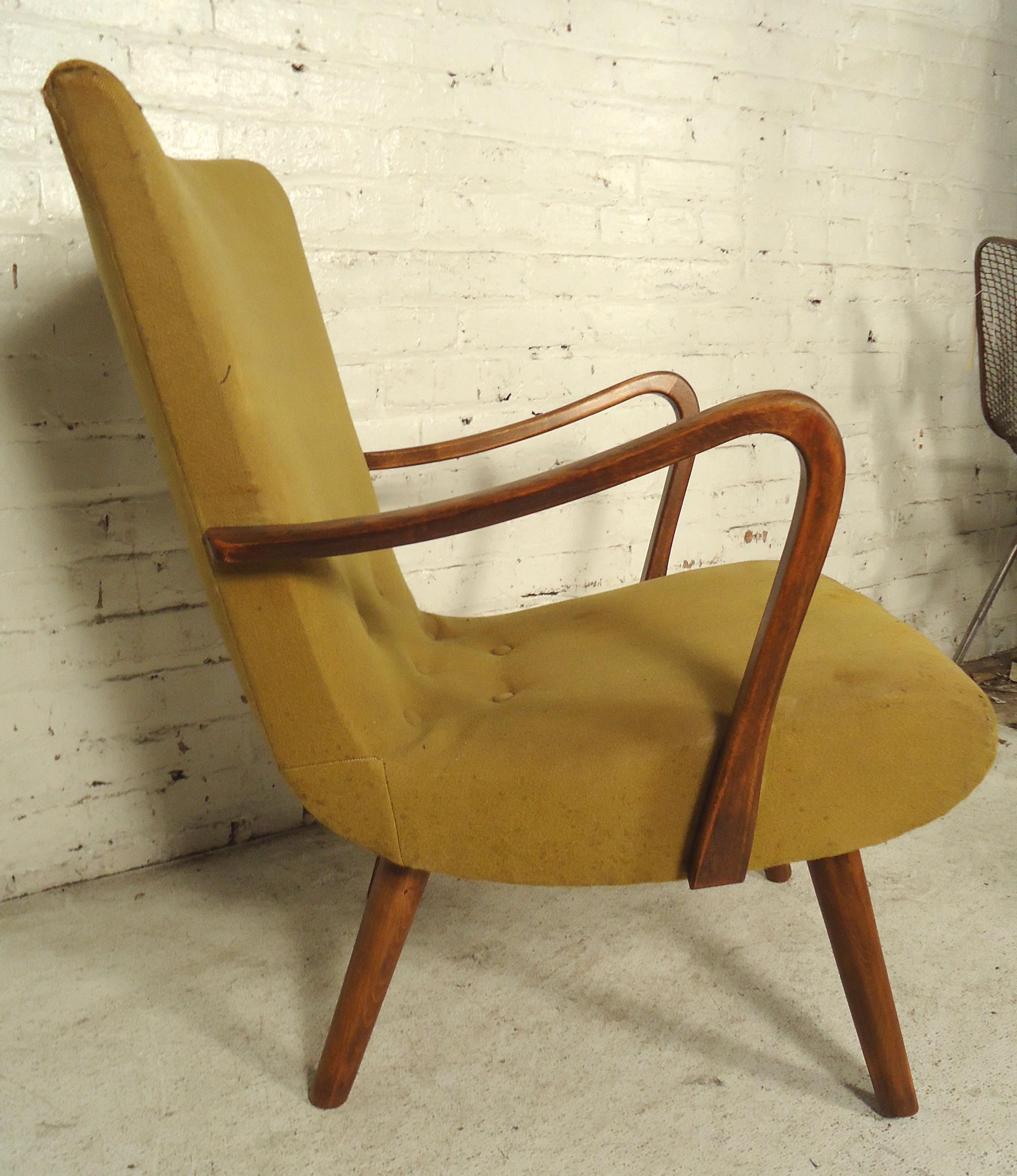Vintage modern lounge chair with walnut arms. Great modern style shape.
(Please confirm item location - NY or NJ - with dealer).
 