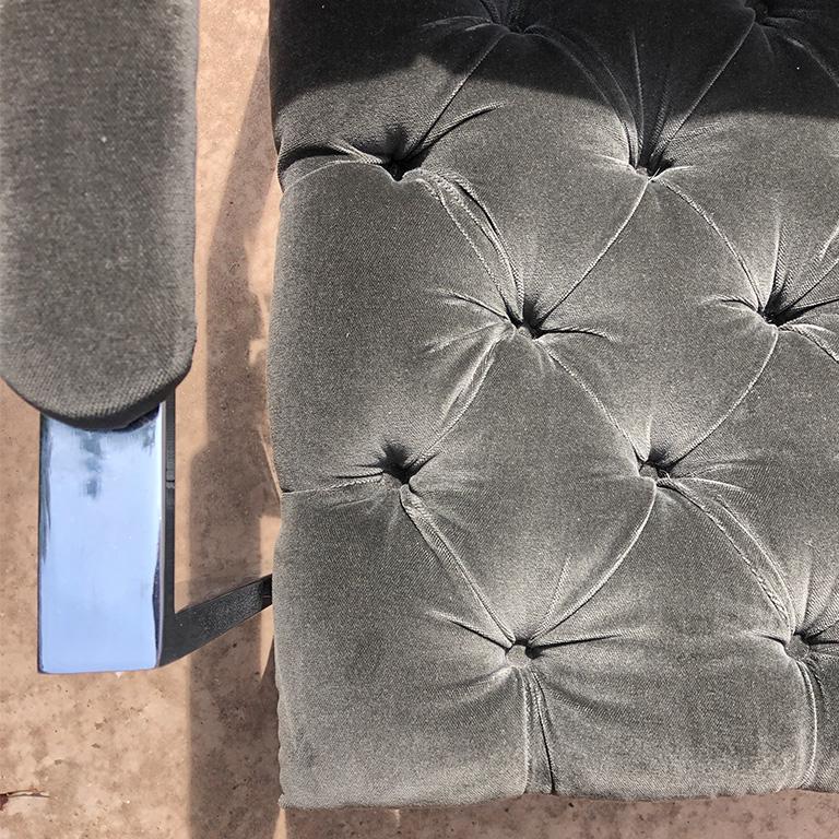 Newly-upholstered vintage chrome chair in the style of Milo Baughman or Harvey Probber. Fabric is a charcoal grey cotton velvet with button tufting on seat and back. No labels, but likely mid-late 20th century. Chrome in generally good condition,