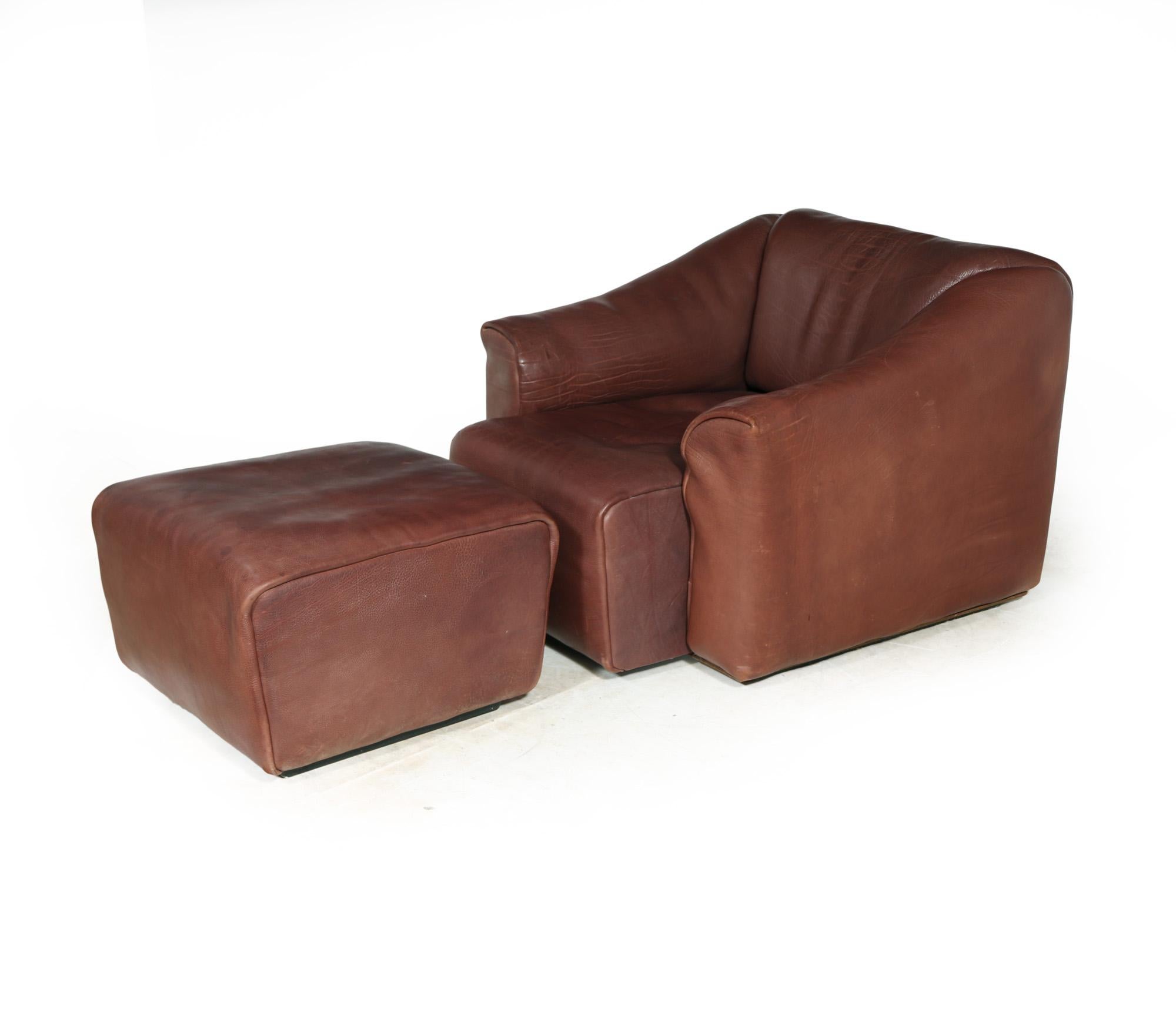 ARMCHAIR AND STOOL -  DS47 BY DESEDE
A Ds47 designed and produced by Desede in the 1970’s this one is in thick bull leather and in excellent condition throughout The DS-47 by DeSede is a true masterpiece in furniture design, boasting a rare and