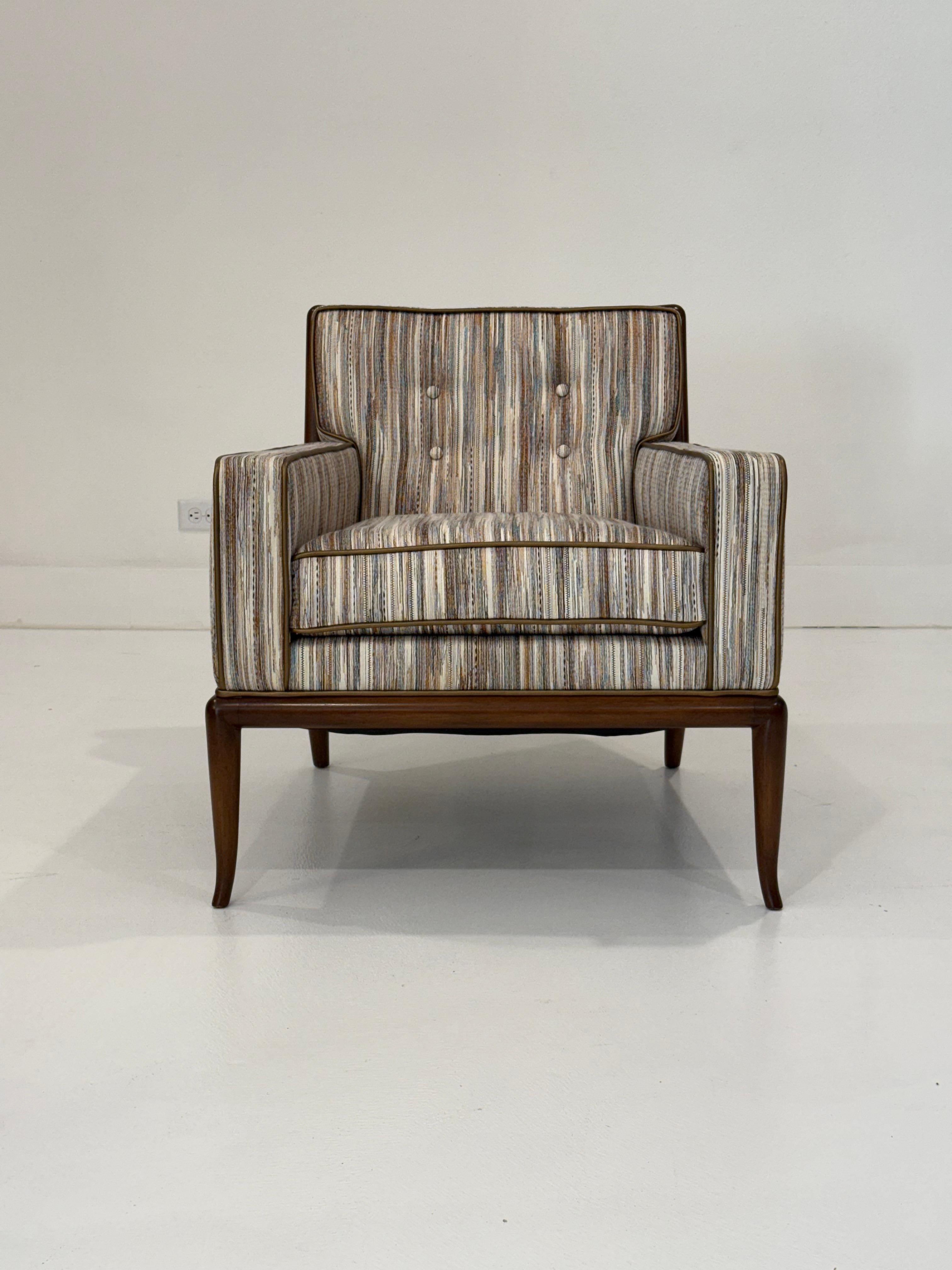 This striking Mid-Century Modern armchair was designed by T.H. Robsjohn-Gibbings for Widdicomb Furniture in the 1950s. Exemplifying the clean lines and refined proportions characteristic of Gibbings’ work, the model 1713 chair features a gently