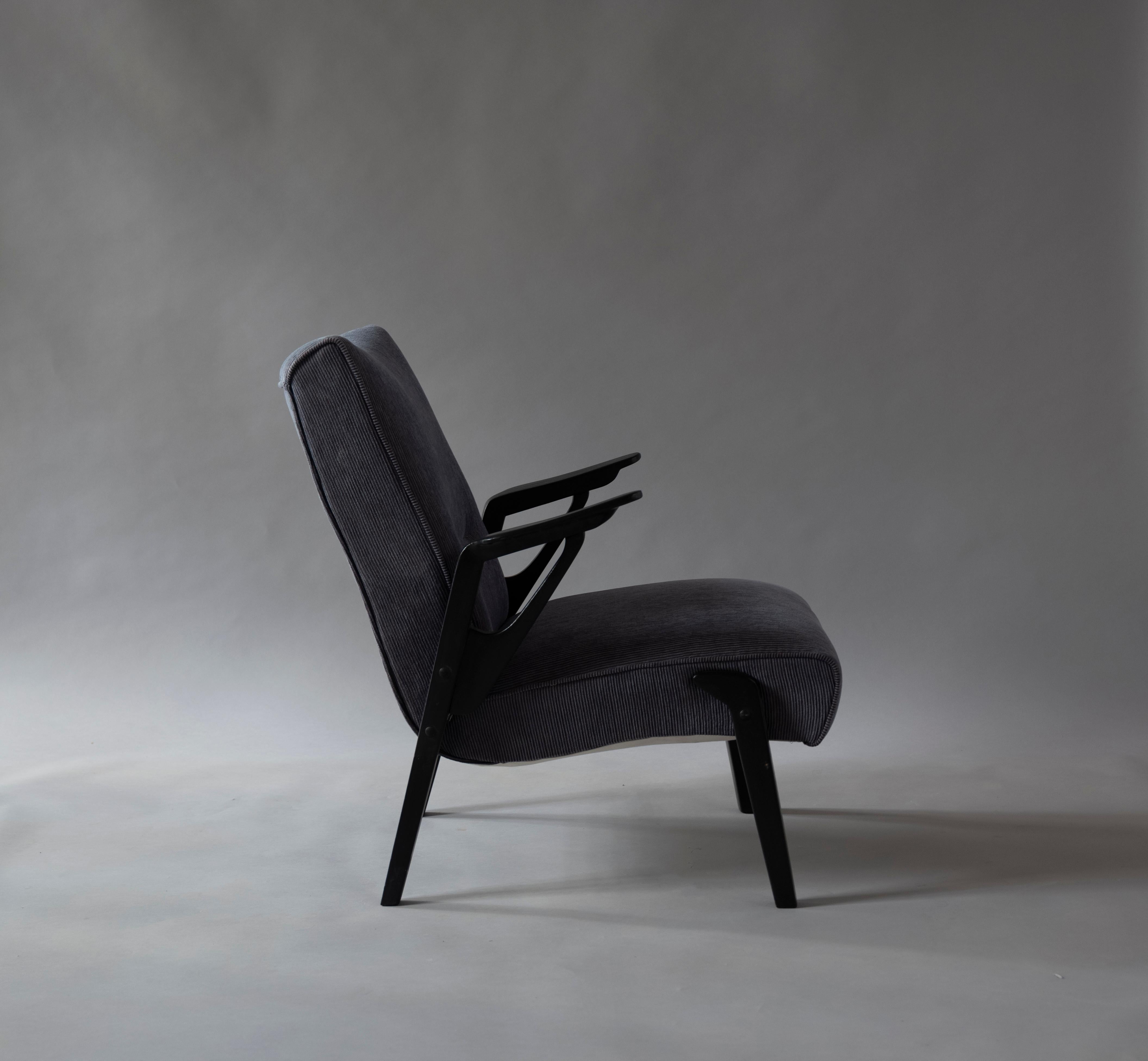 Beautiful Danish midcentury armchair in ebonized oak frame, upholstered in Zimmer+Rohde fabric.