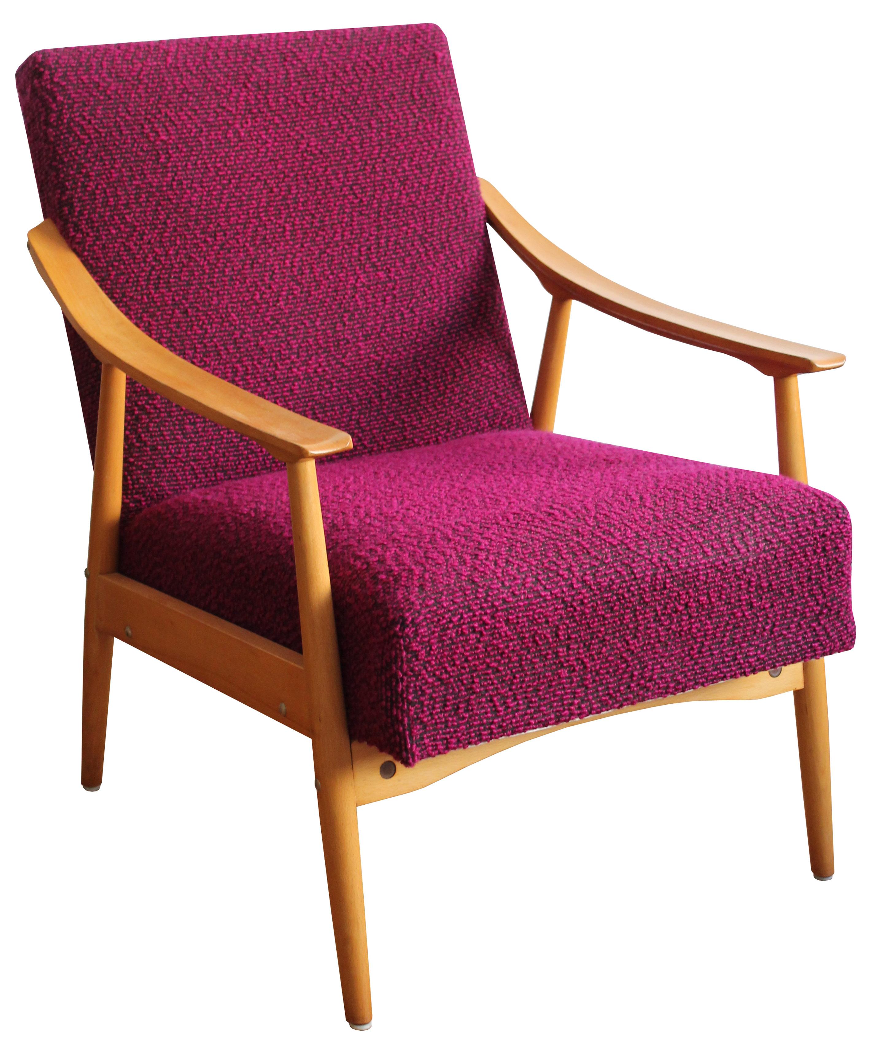A midcentury armchair. Rare, unusual, comfortable and fun. That is probably the best way to describe this midcentury armchair.

The piece still has the original bright red/ pink fabric which creates a great contrast with the light tone of the