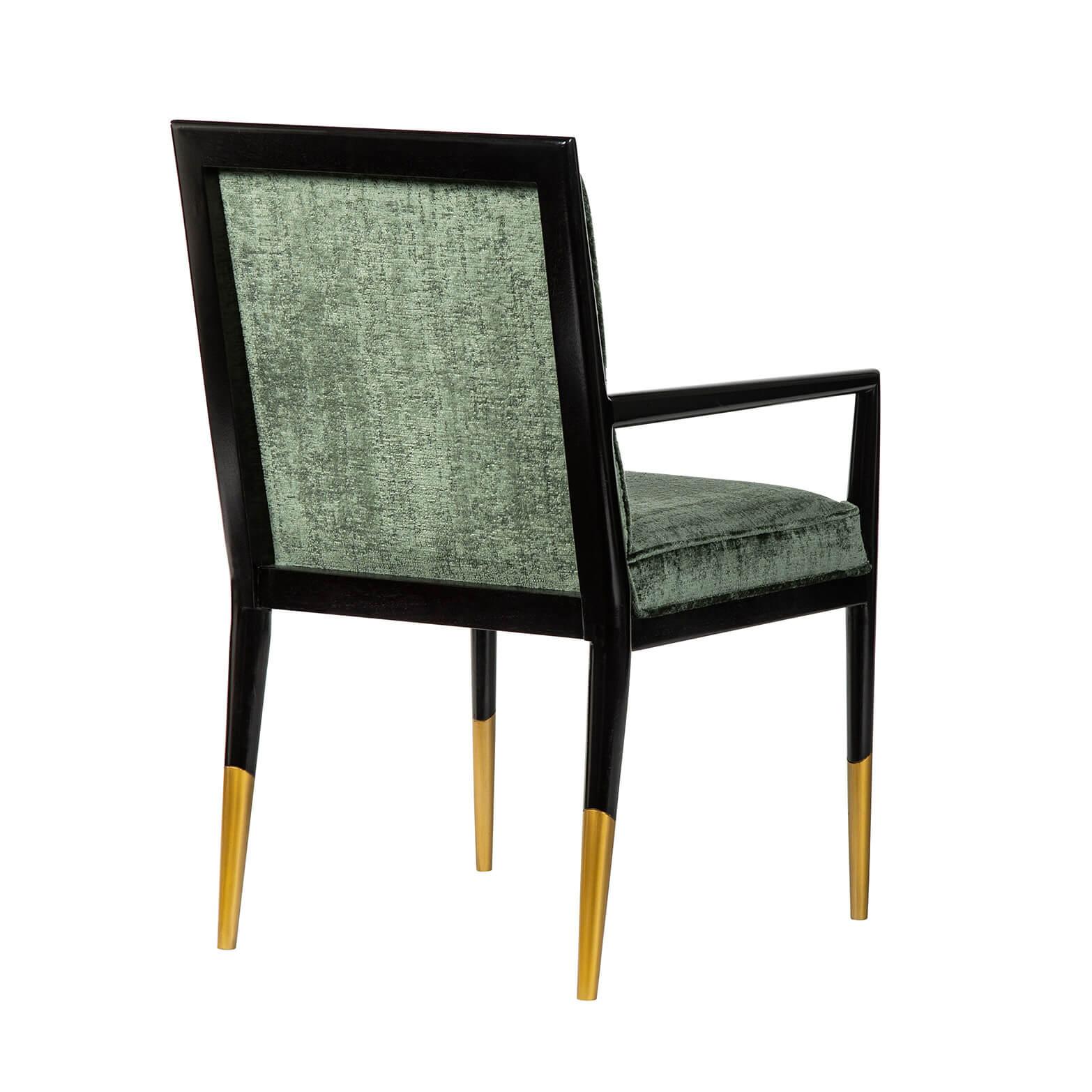 Mid-Century Modern style lacquered square back armchair with a boxed cushion back and seat, tapered javelin supports and long brass foot caps.
Priced as shown.
Dimensions: 23