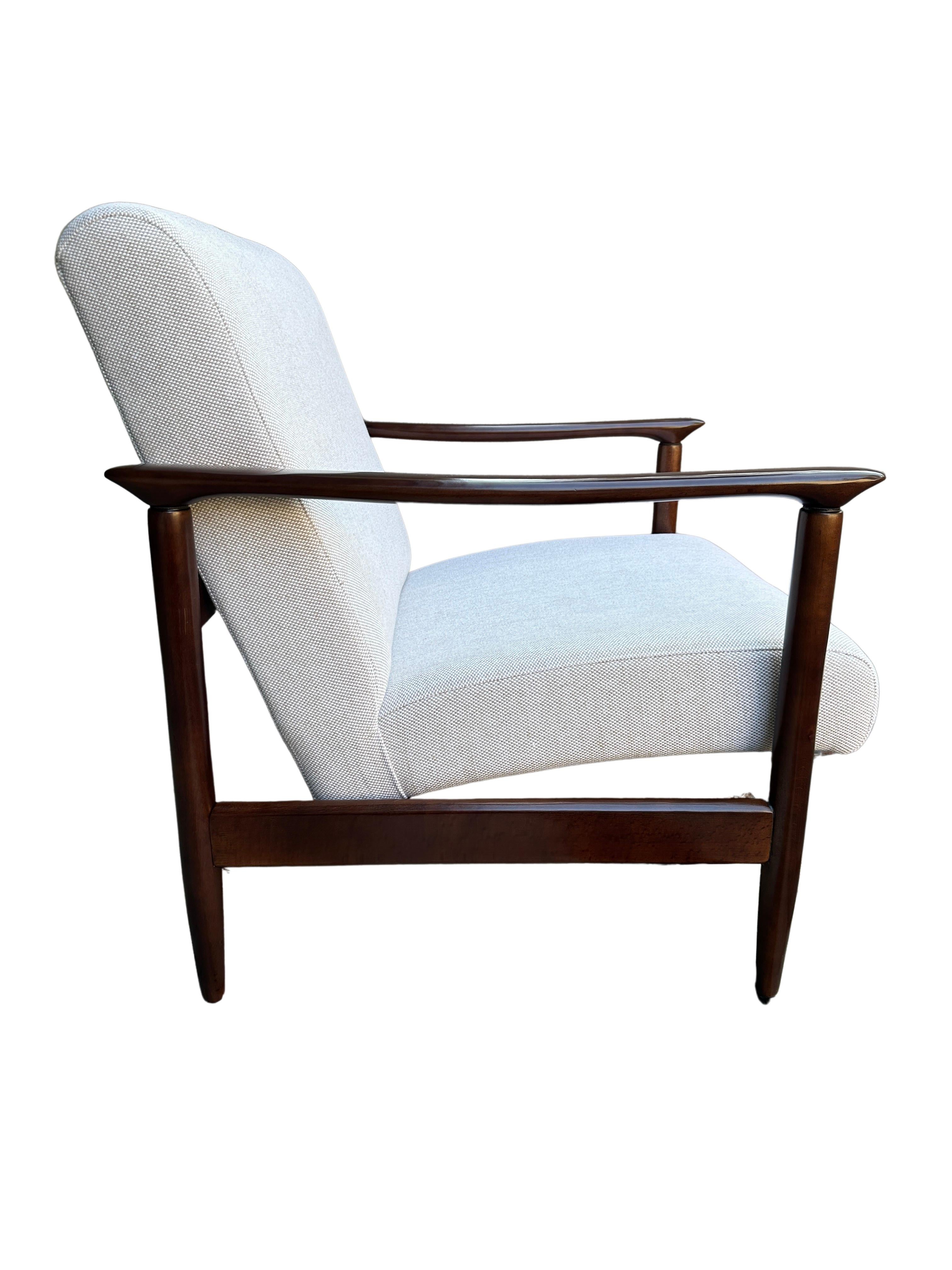 One of the icon of Polish mid-century design, an armchair, designed by Edmund Homa - Polish architect, industrial and interior design designer, professor at the Academy of Fine Arts in Gdansk. 
The armchair has been manufactured by Goscicinska